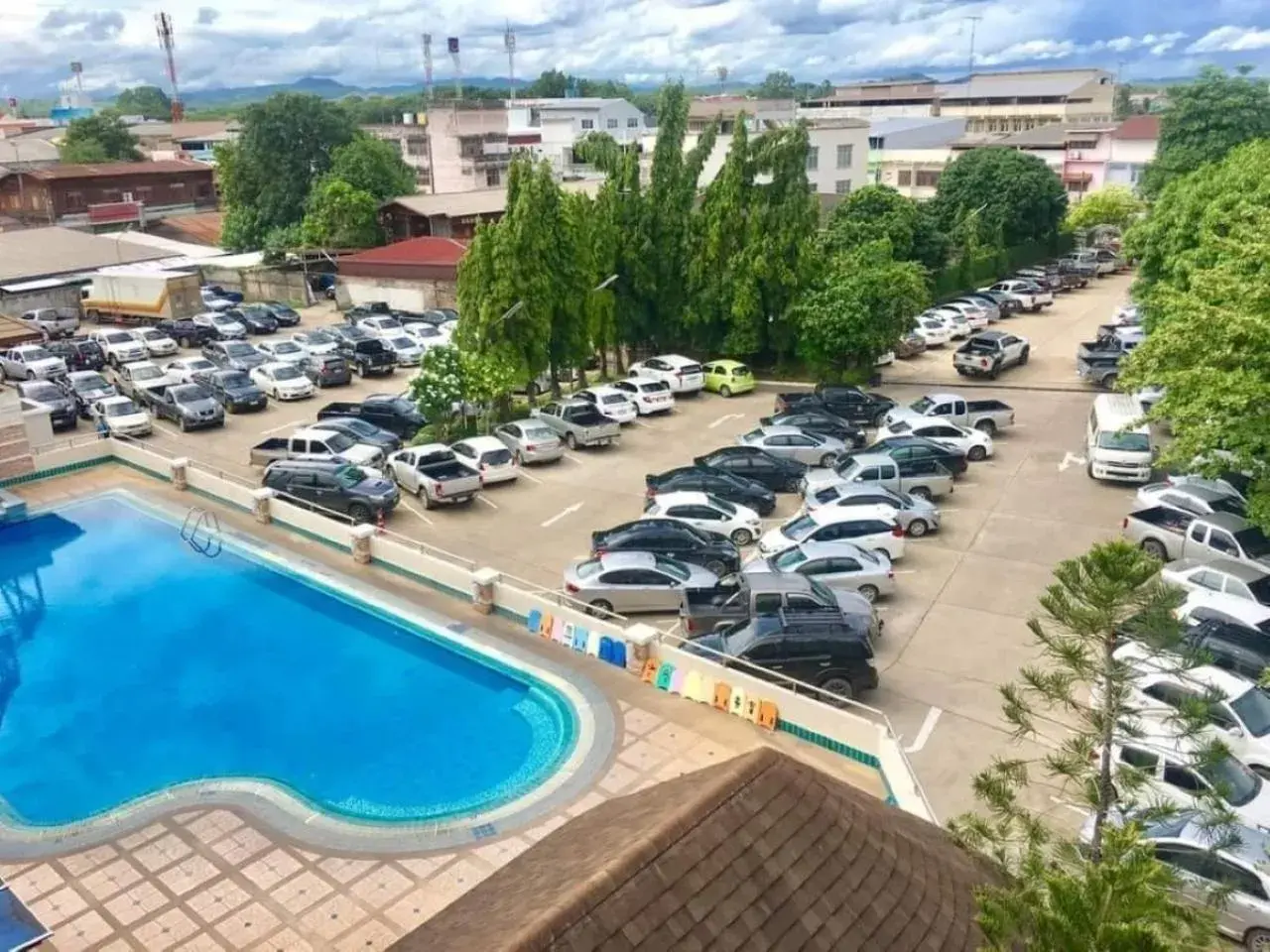 Parking, Pool View in Dhevaraj Hotel