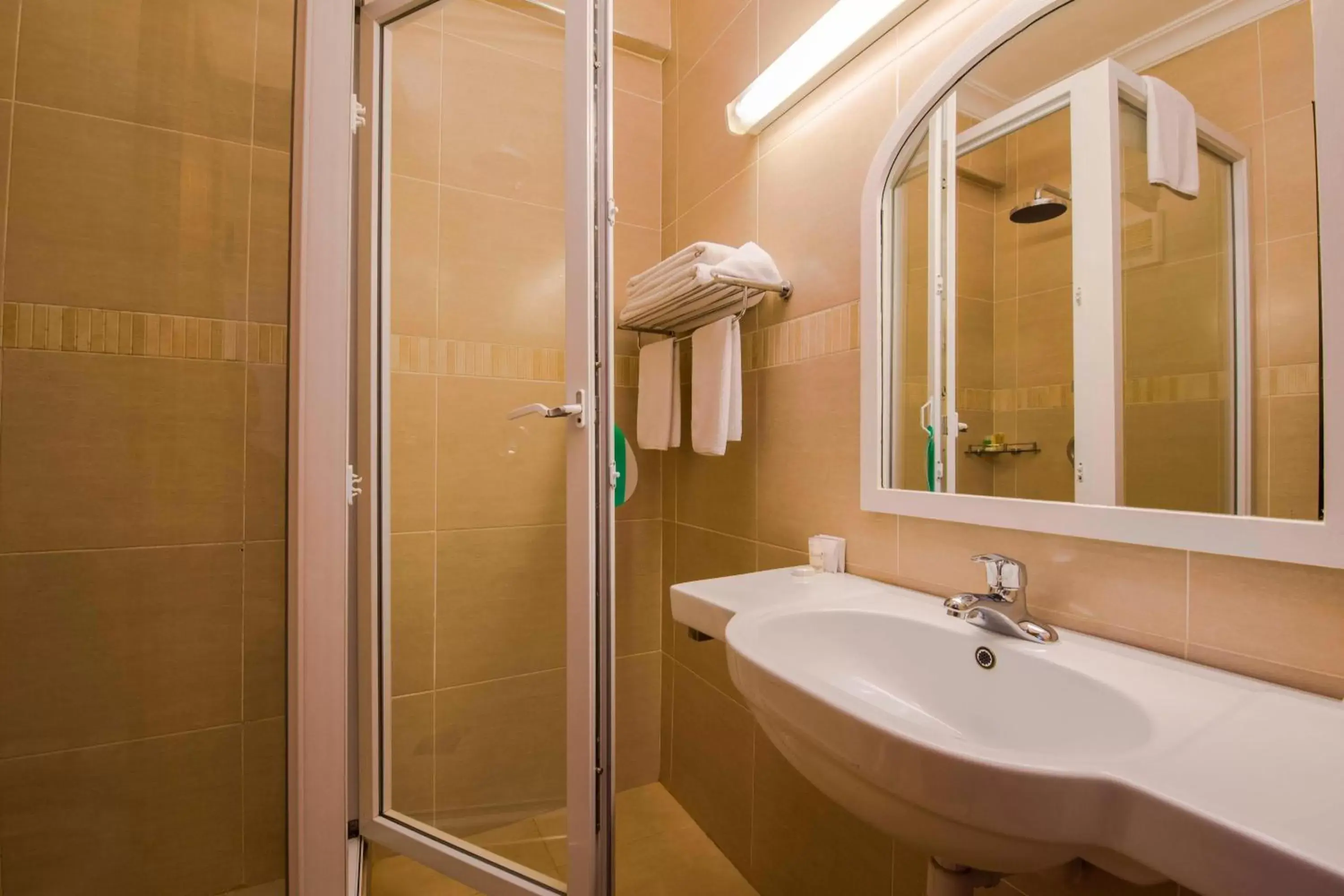 Bathroom in Protea Hotel by Marriott Dar es Salaam Courtyard