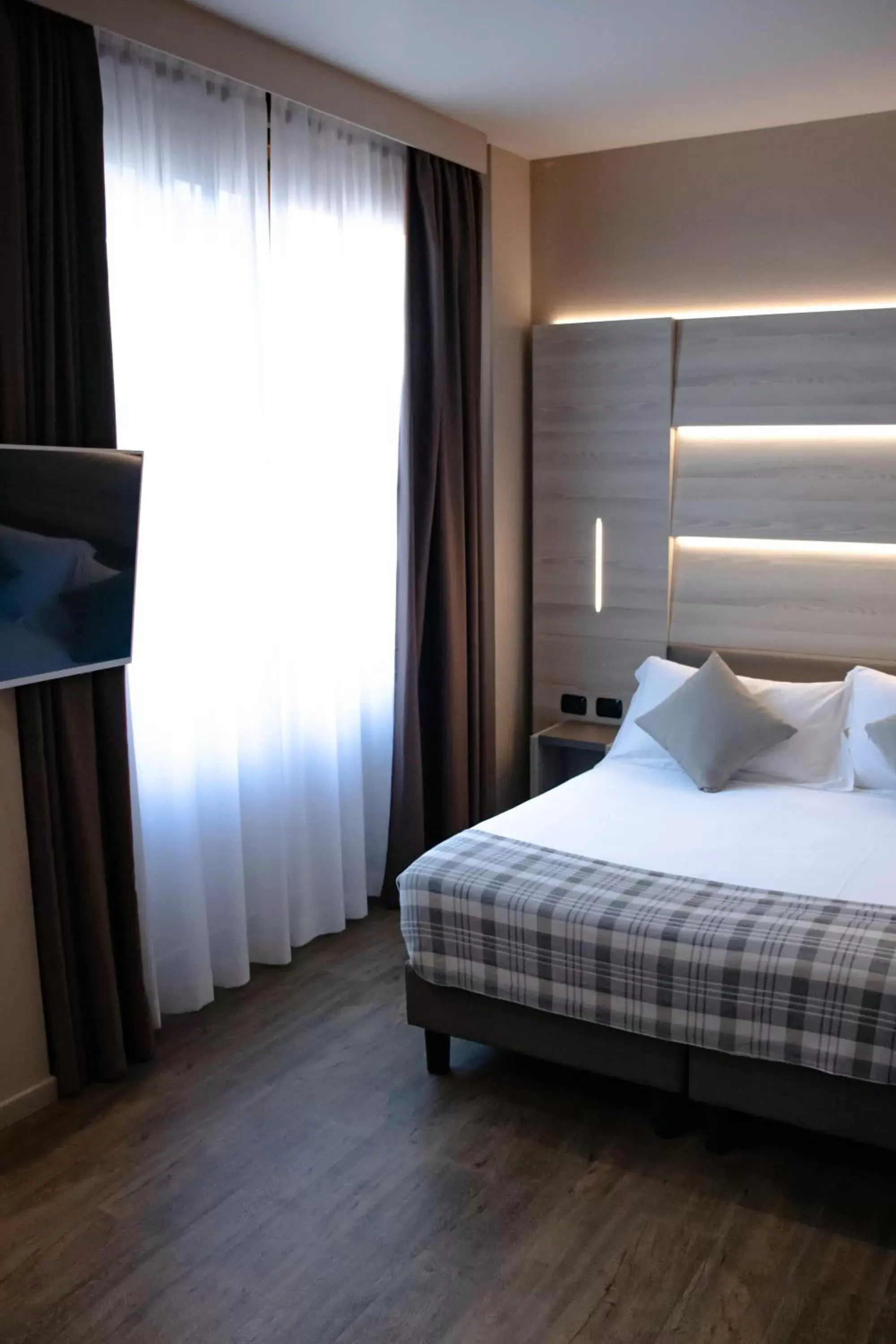 Bed in Duomo Hotel & Apartments