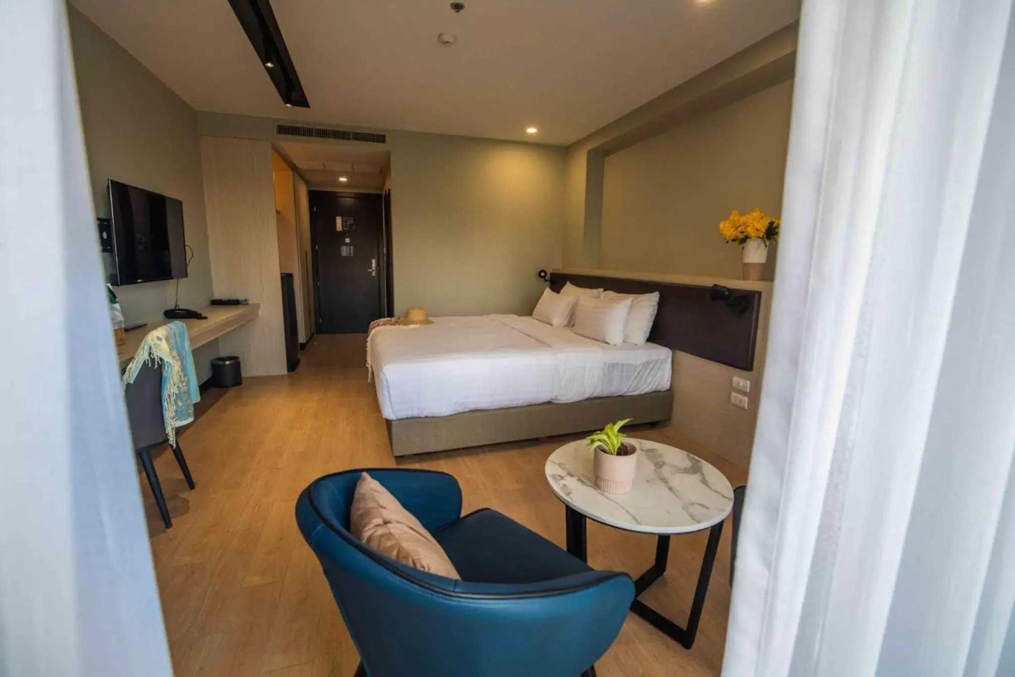 Bedroom in Lewit Hotel Pattaya, a member of Radisson Individuals