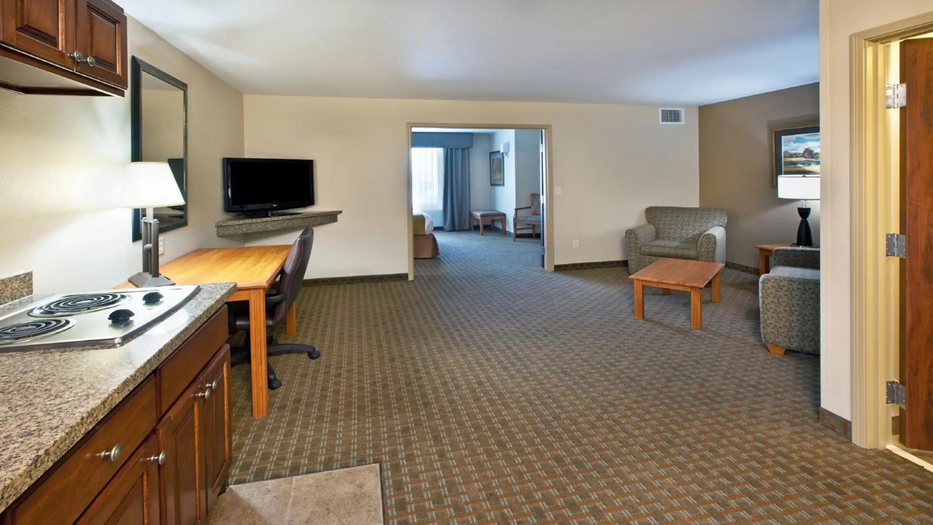 Photo of the whole room, TV/Entertainment Center in Holiday Inn Express & Suites Sioux Falls Southwest, an IHG Hotel