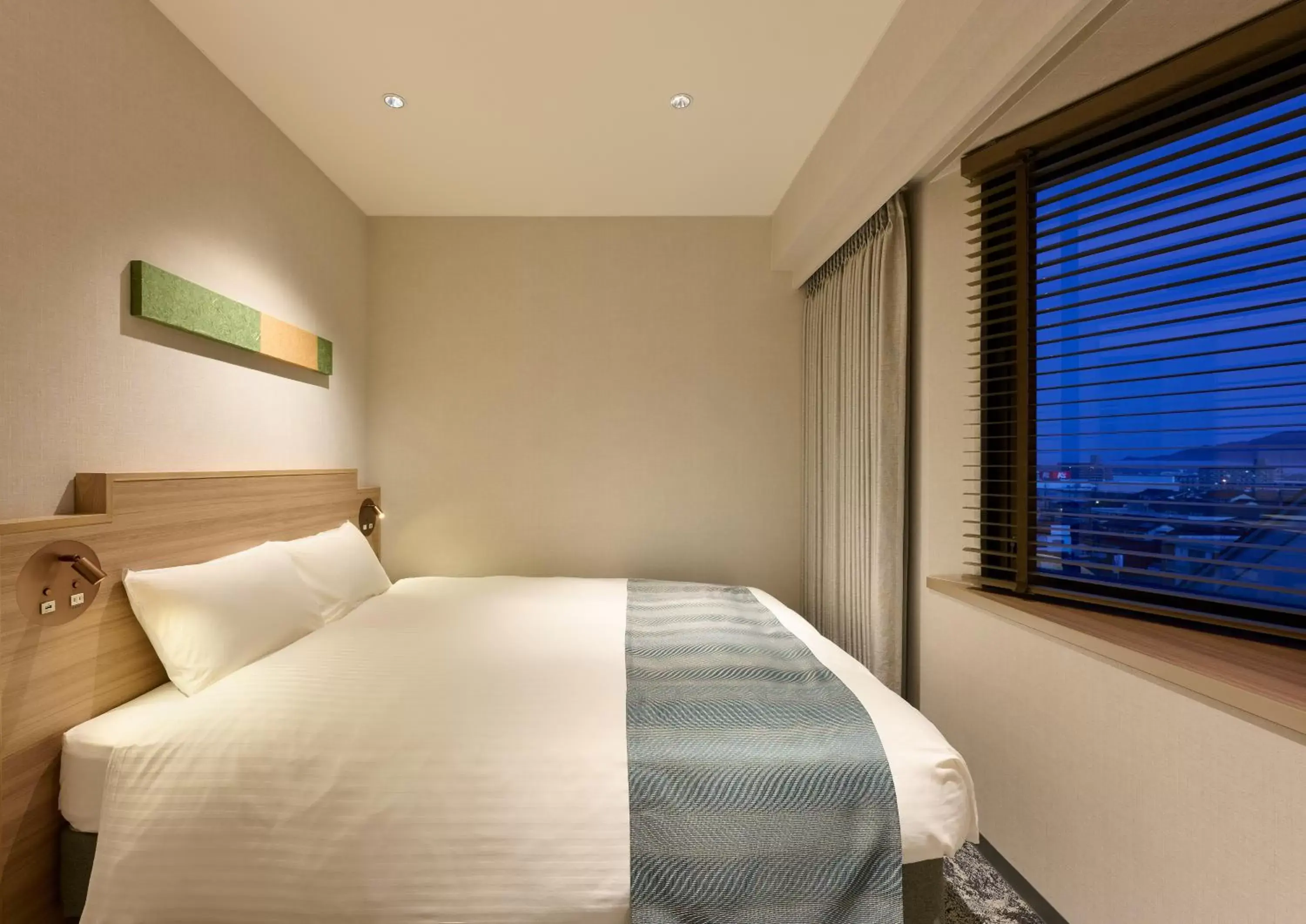 Bed in Izumo Royal Hotel