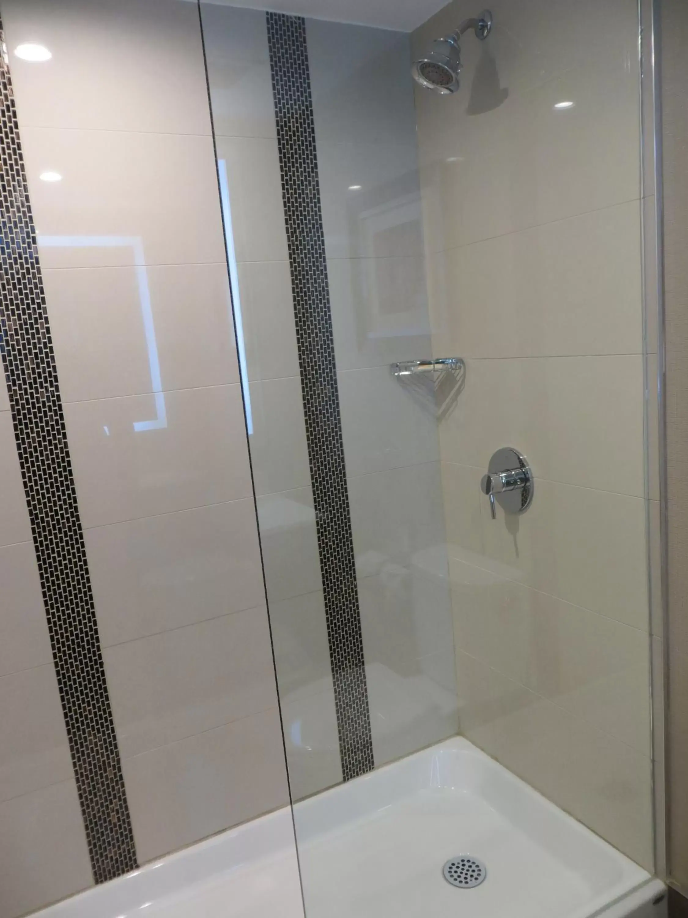 Shower, Bathroom in Holiday Inn Sudbury, an IHG Hotel