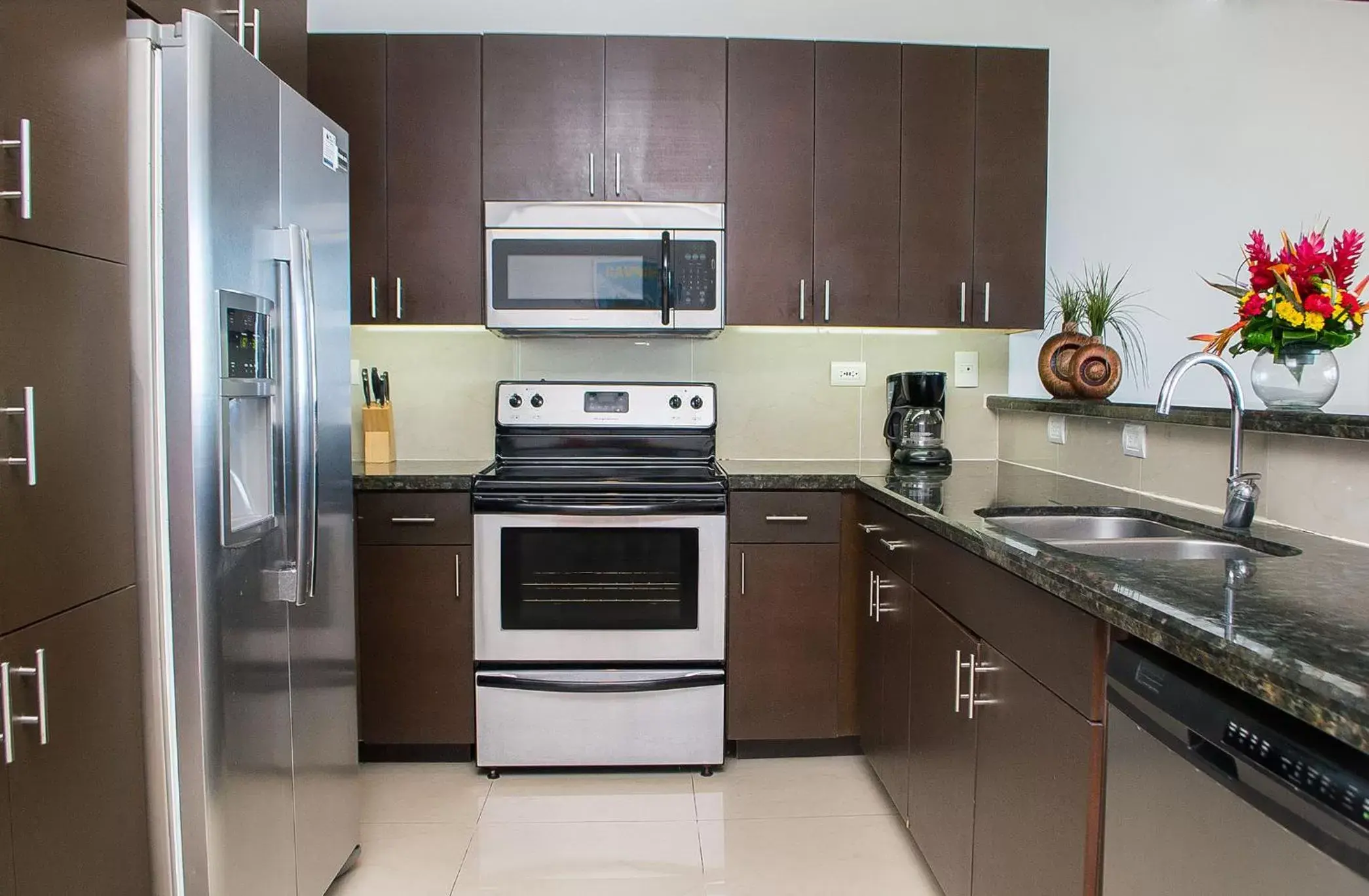 Kitchen/Kitchenette in Best in Jaco Condos at Diamante del Sol