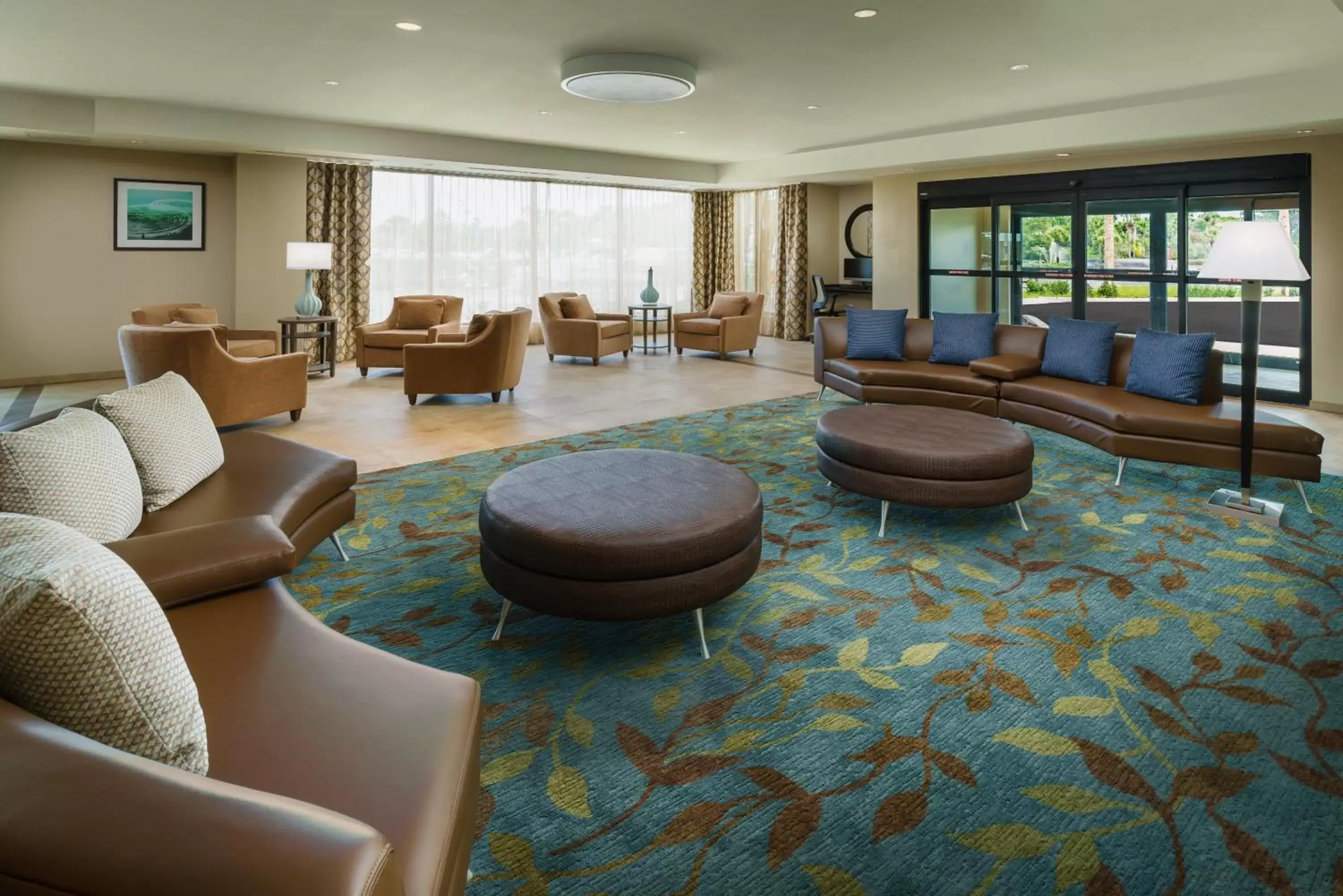 Lobby or reception, Lounge/Bar in Candlewood Suites - Orlando - Lake Buena Vista, an IHG Hotel