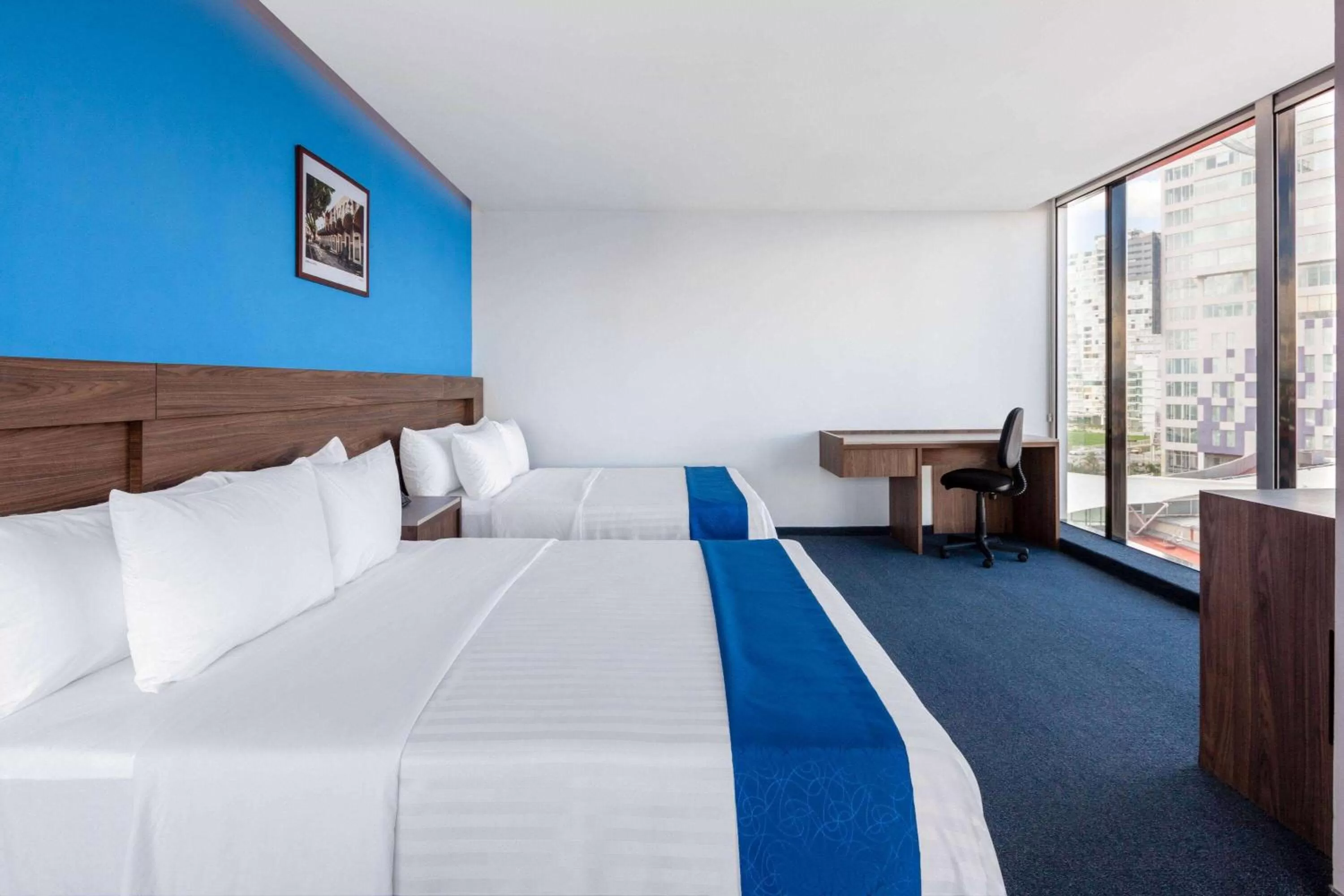Photo of the whole room, Bed in Wyndham Puebla Angelopolis