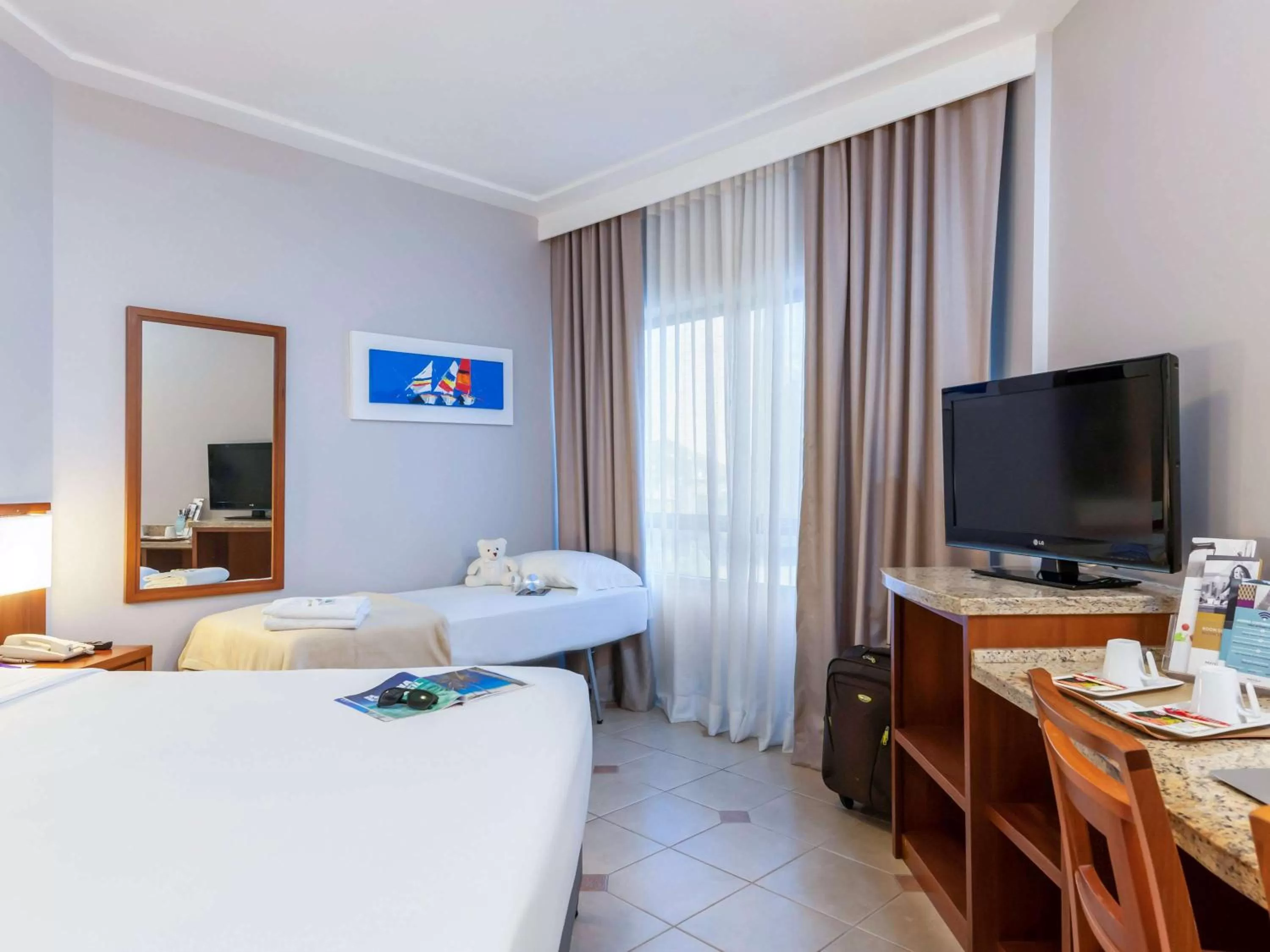 Photo of the whole room, Bed in Mercure Florianópolis