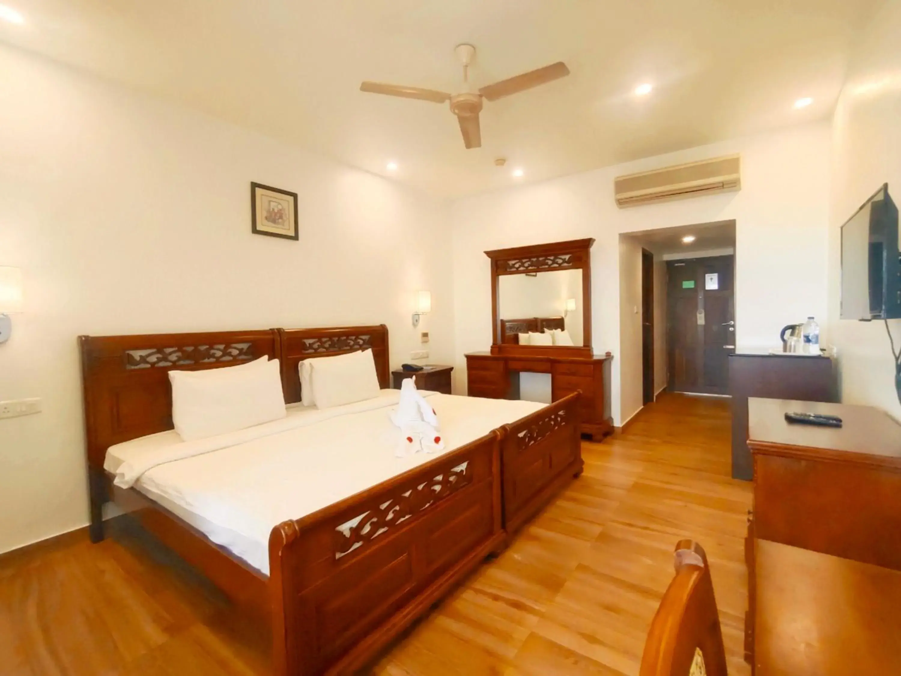 Bed in The Travancore Heritage Beach Resort