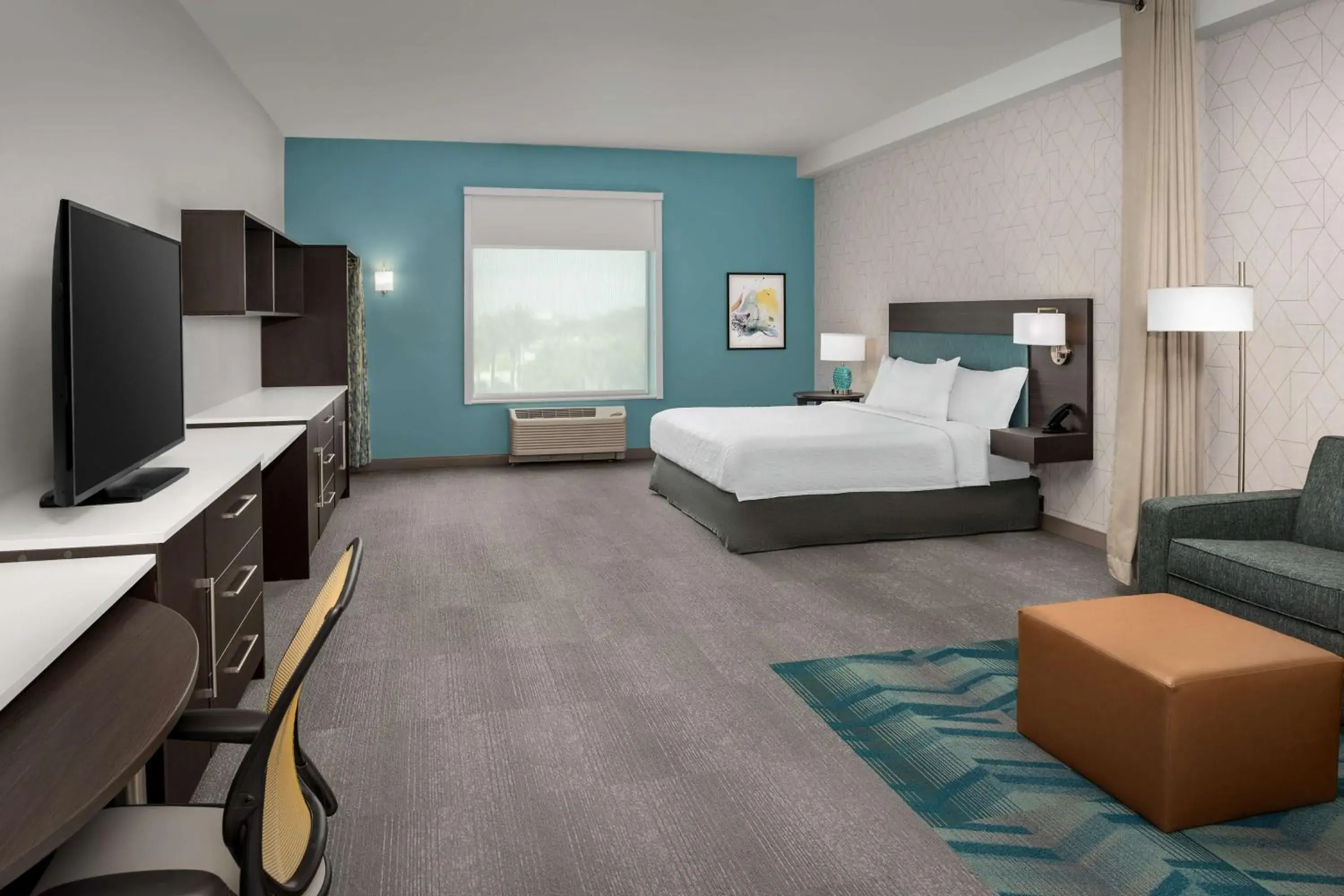 Bedroom, TV/Entertainment Center in Home2 Suites Orlando Lake Nona