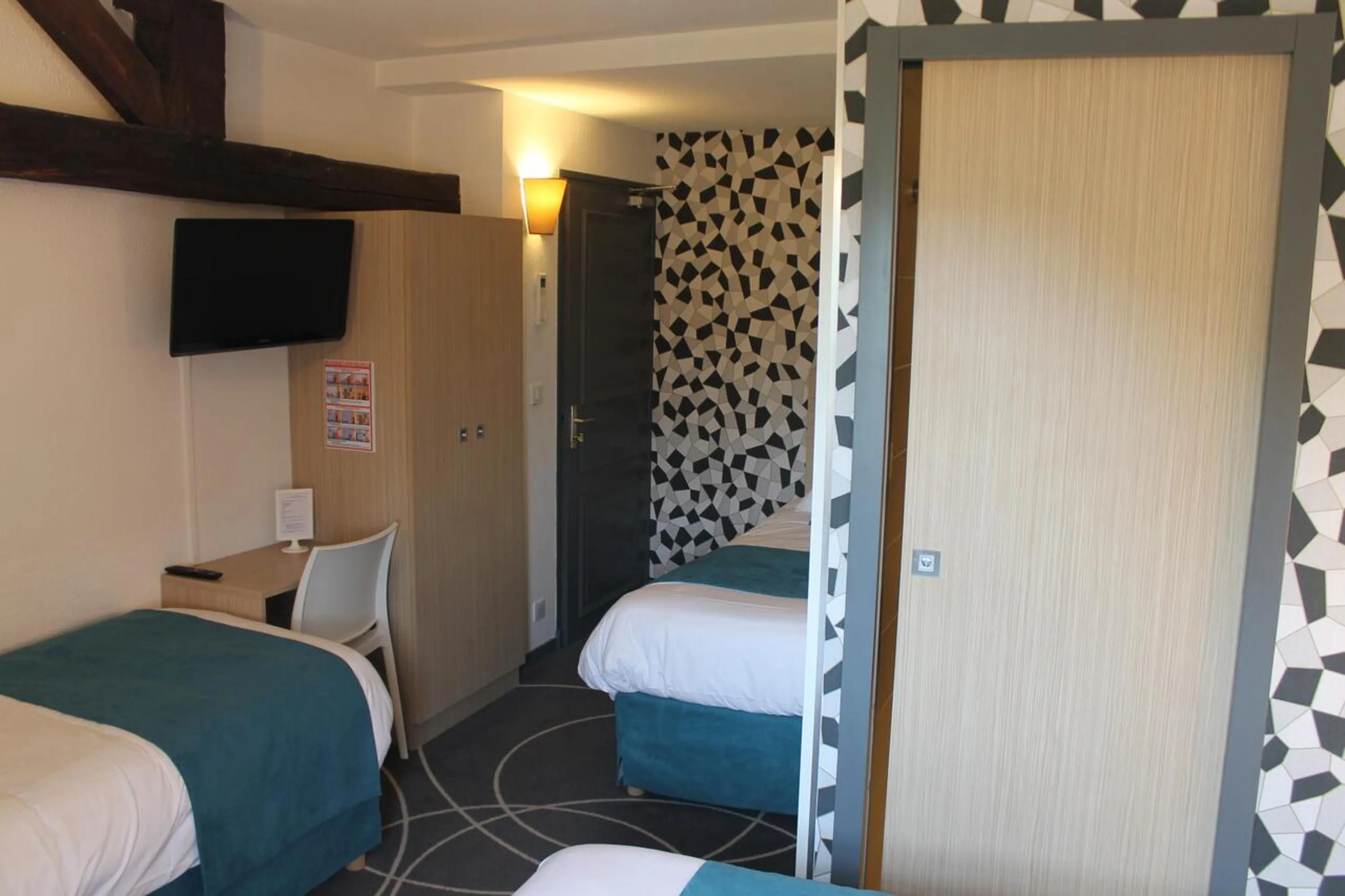 Bed in Hôtel Le Blason