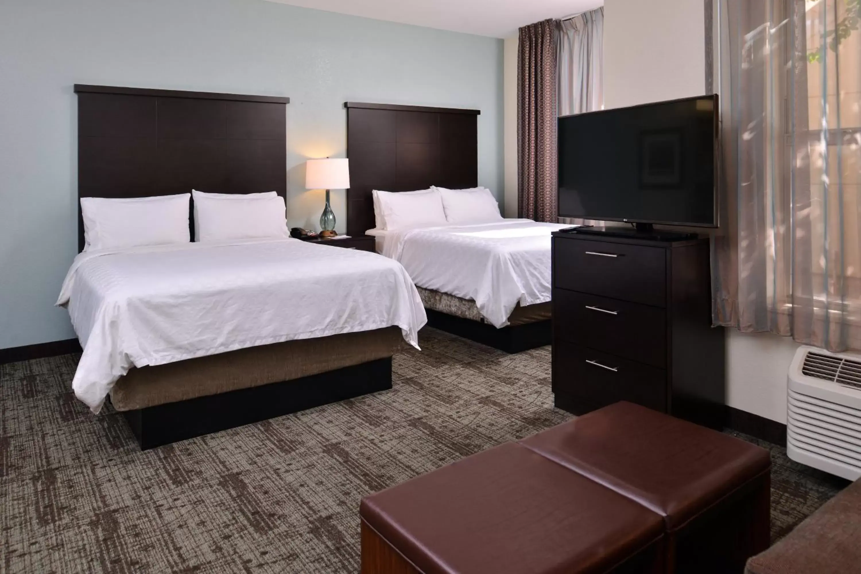 Photo of the whole room, Bed in Staybridge Suites Wichita Falls, an IHG Hotel