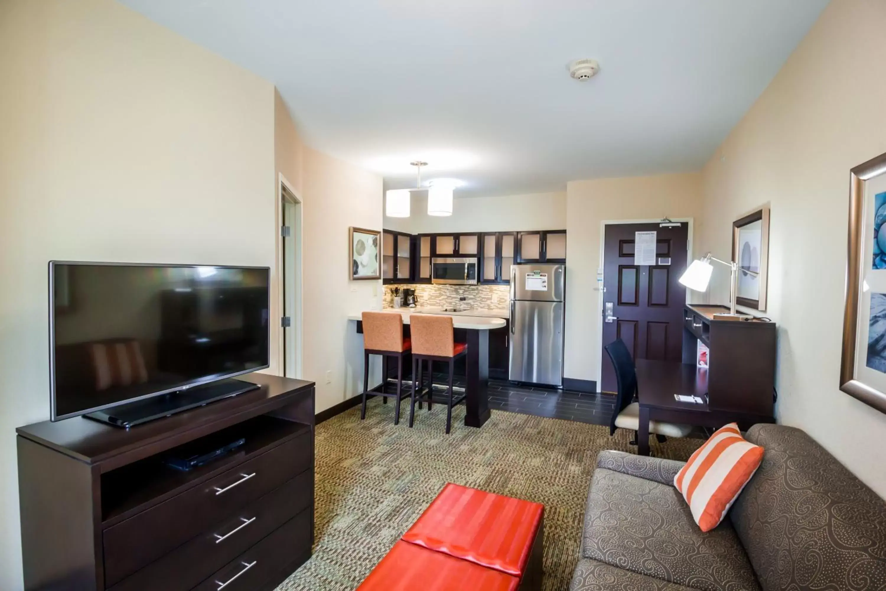 Photo of the whole room, TV/Entertainment Center in Staybridge Suites Plano - Legacy West Area, an IHG Hotel