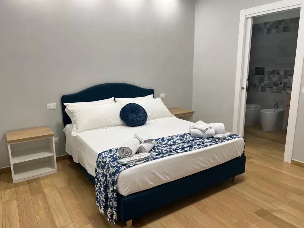 Bed in Nike Luxury Rooms