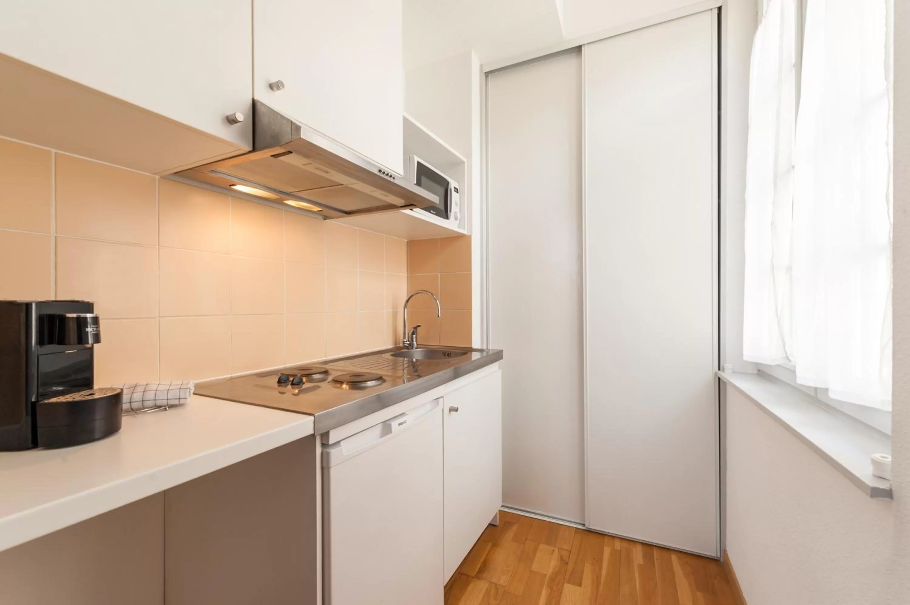 Kitchen or kitchenette in Residhotel Vieux Port