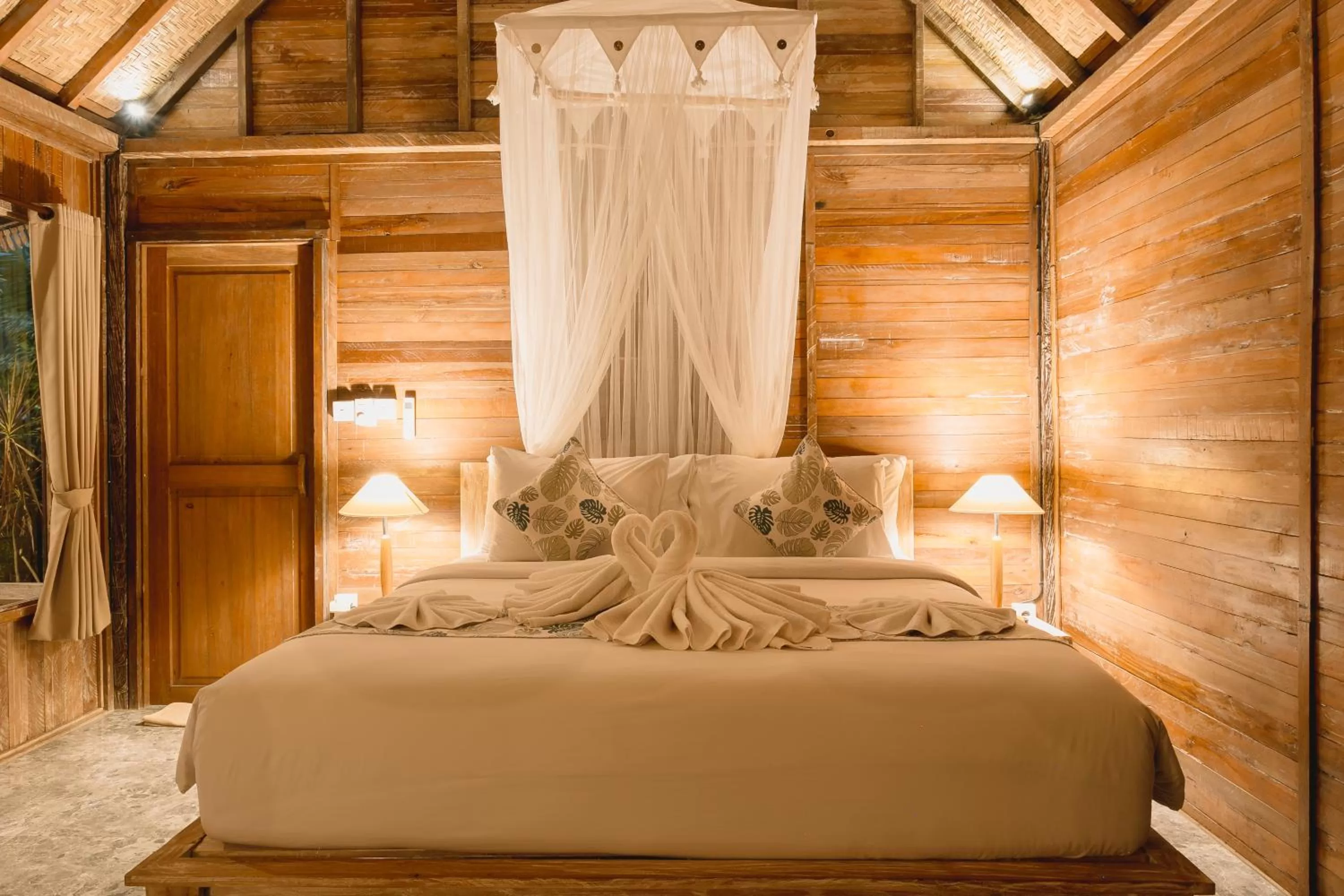 Bed in Nauna Villa Ubud