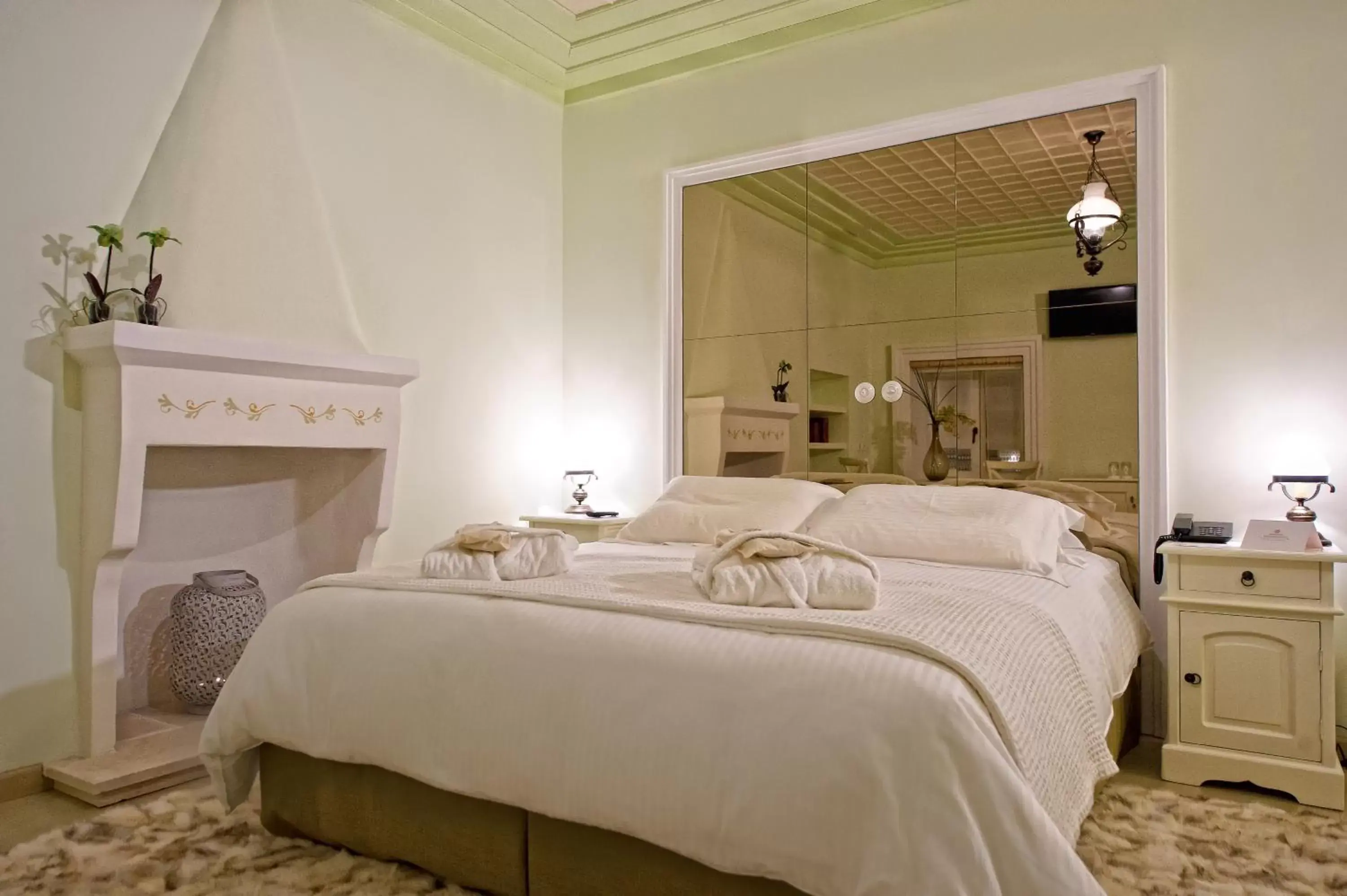 Bed in Orologopoulos Mansion Luxury Hotel