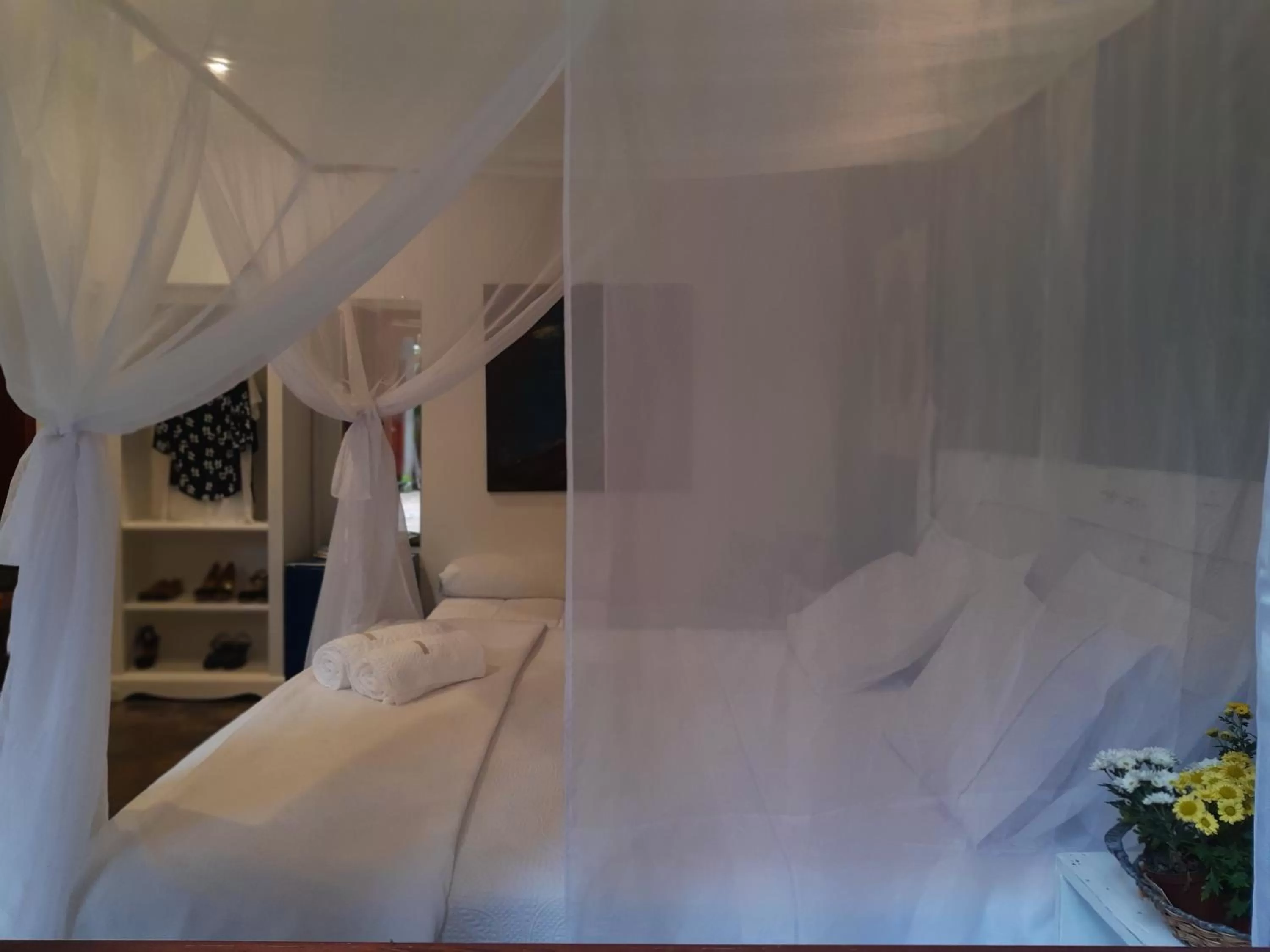 Bed in Magias de Paraty Ecopousada