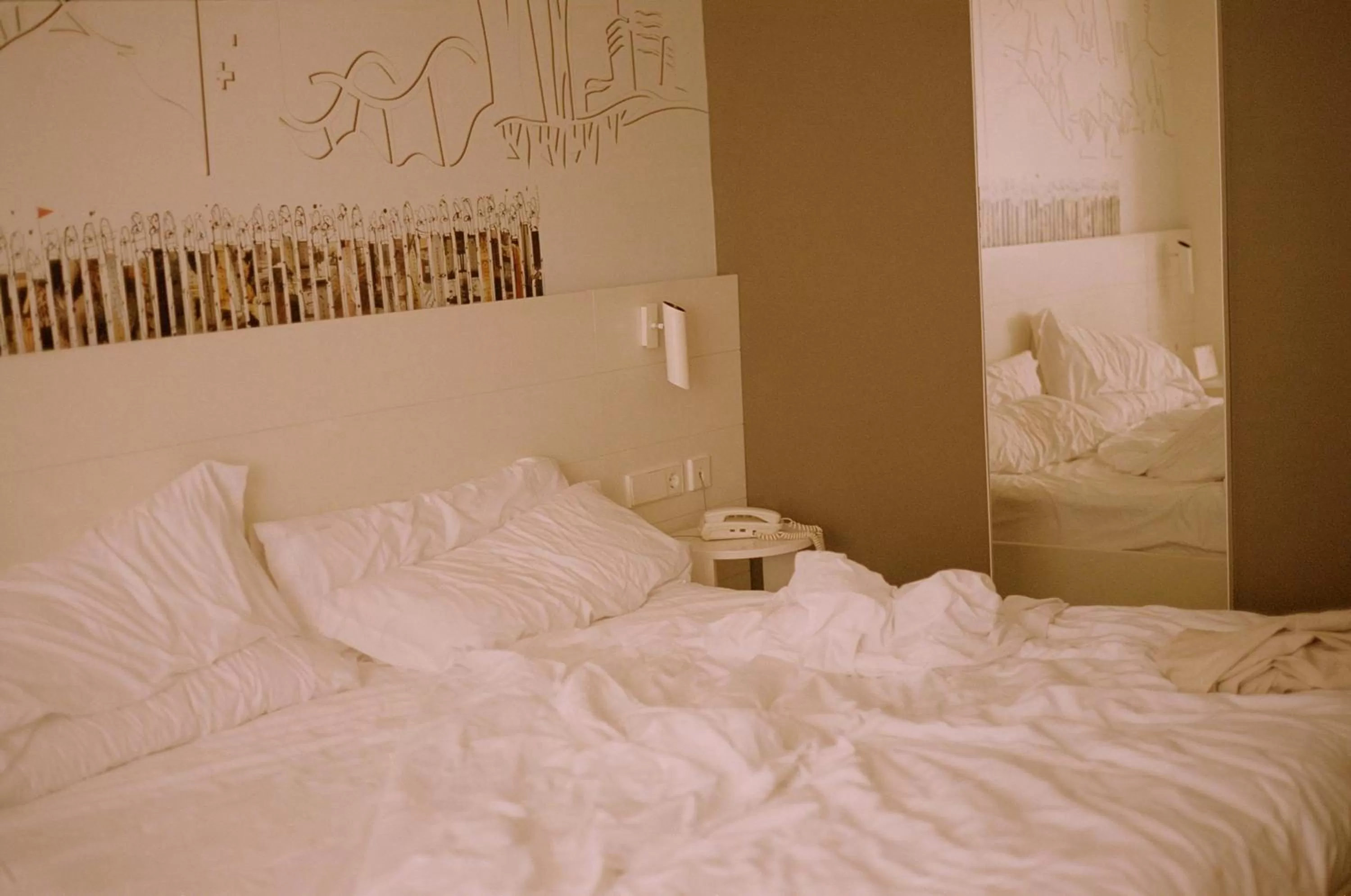 Bed in Pol & Grace Hotel