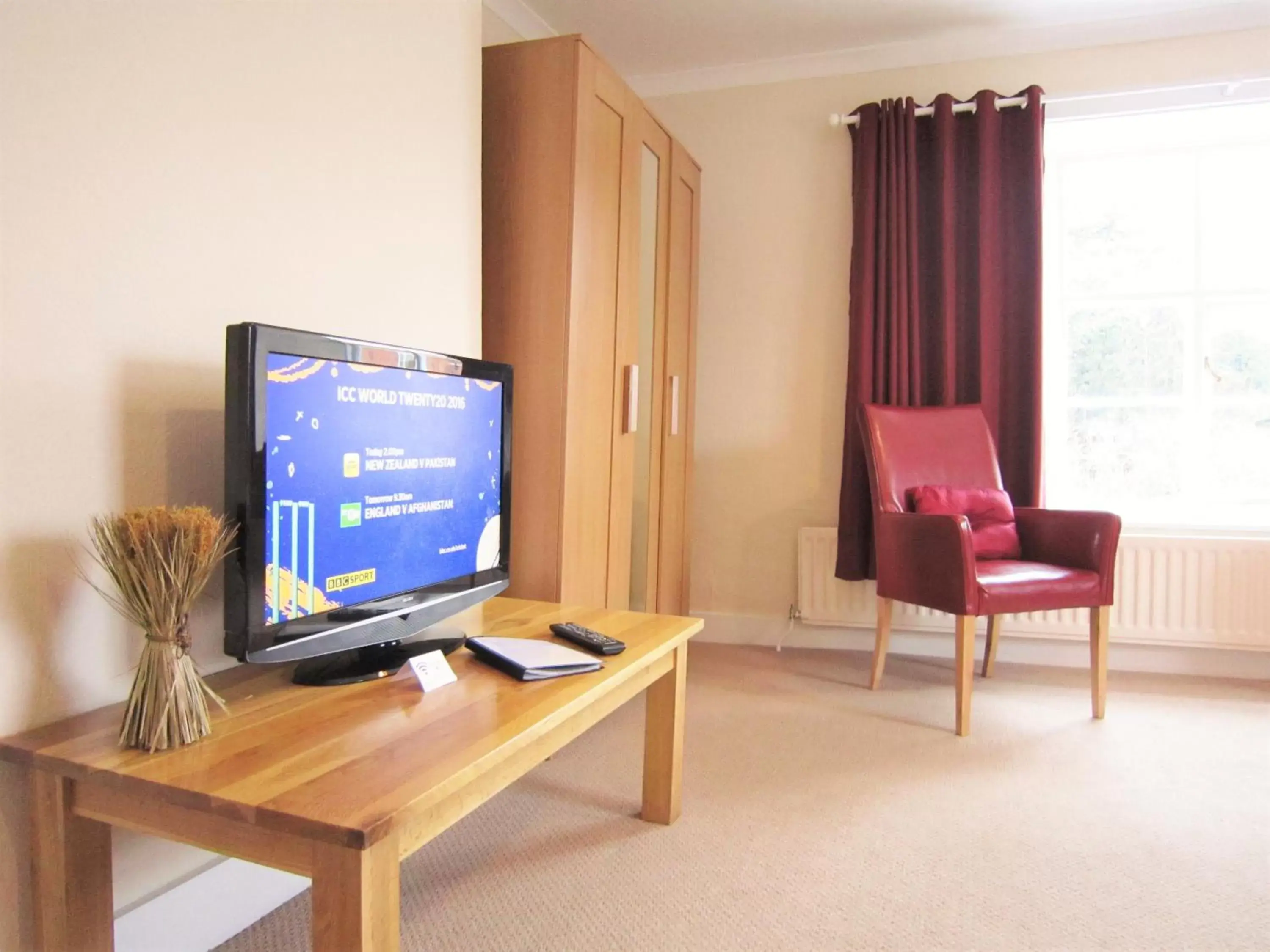 Decorative detail, TV/Entertainment Center in The Wheatsheaf