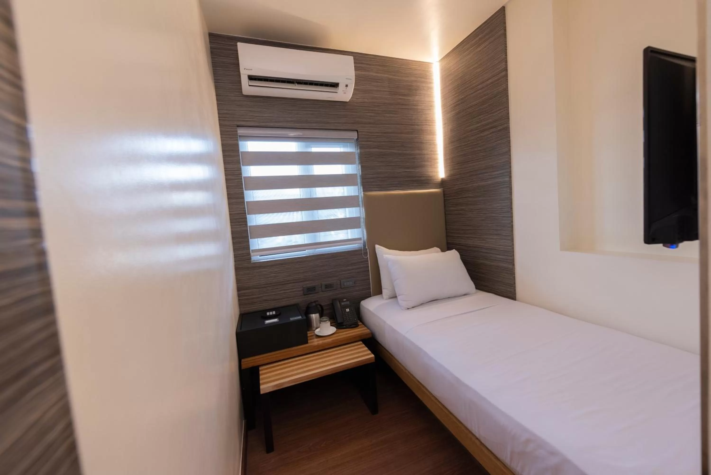 Bed in Kabayan Hotel Pasay