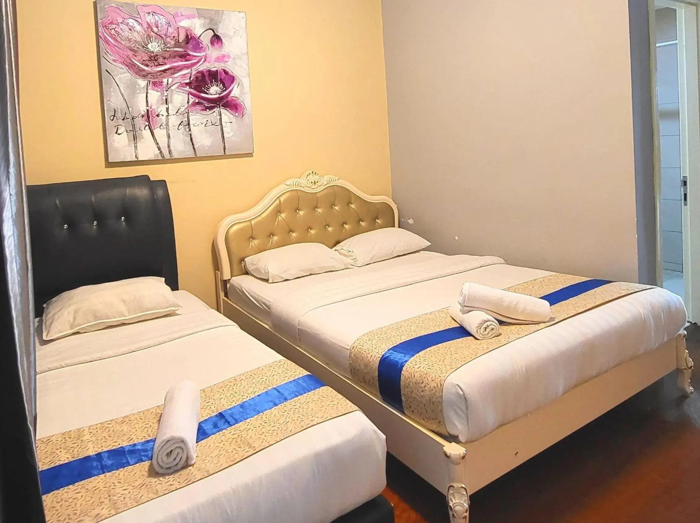 Bed in Sunset Seaview Vacation Condos @ IMAGO Shopping Mall