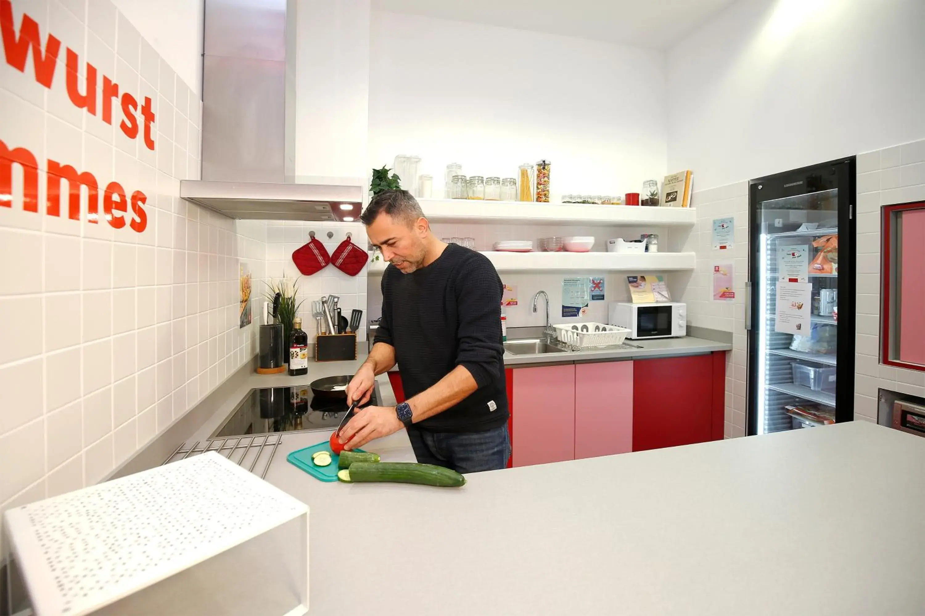 Communal kitchen in MEININGER Hotel Berlin Hauptbahnhof