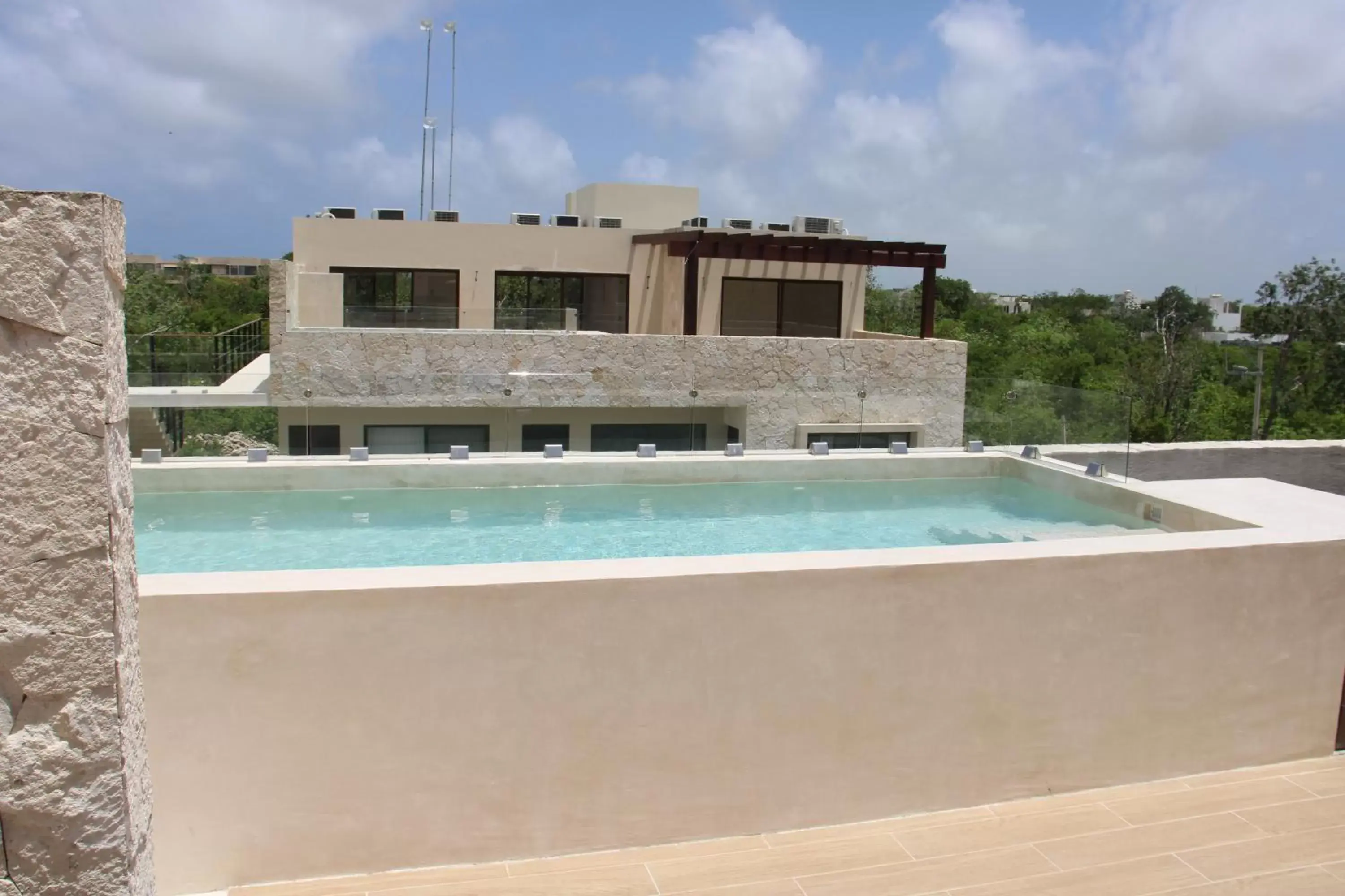 Pool view, Swimming Pool in Apartment and Penthouse Blue Luxury Kukulkan Tulum