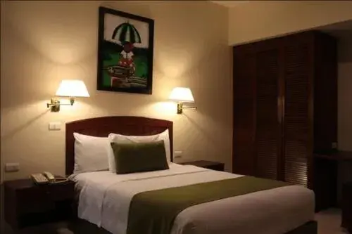 Bed in Tabasco Inn