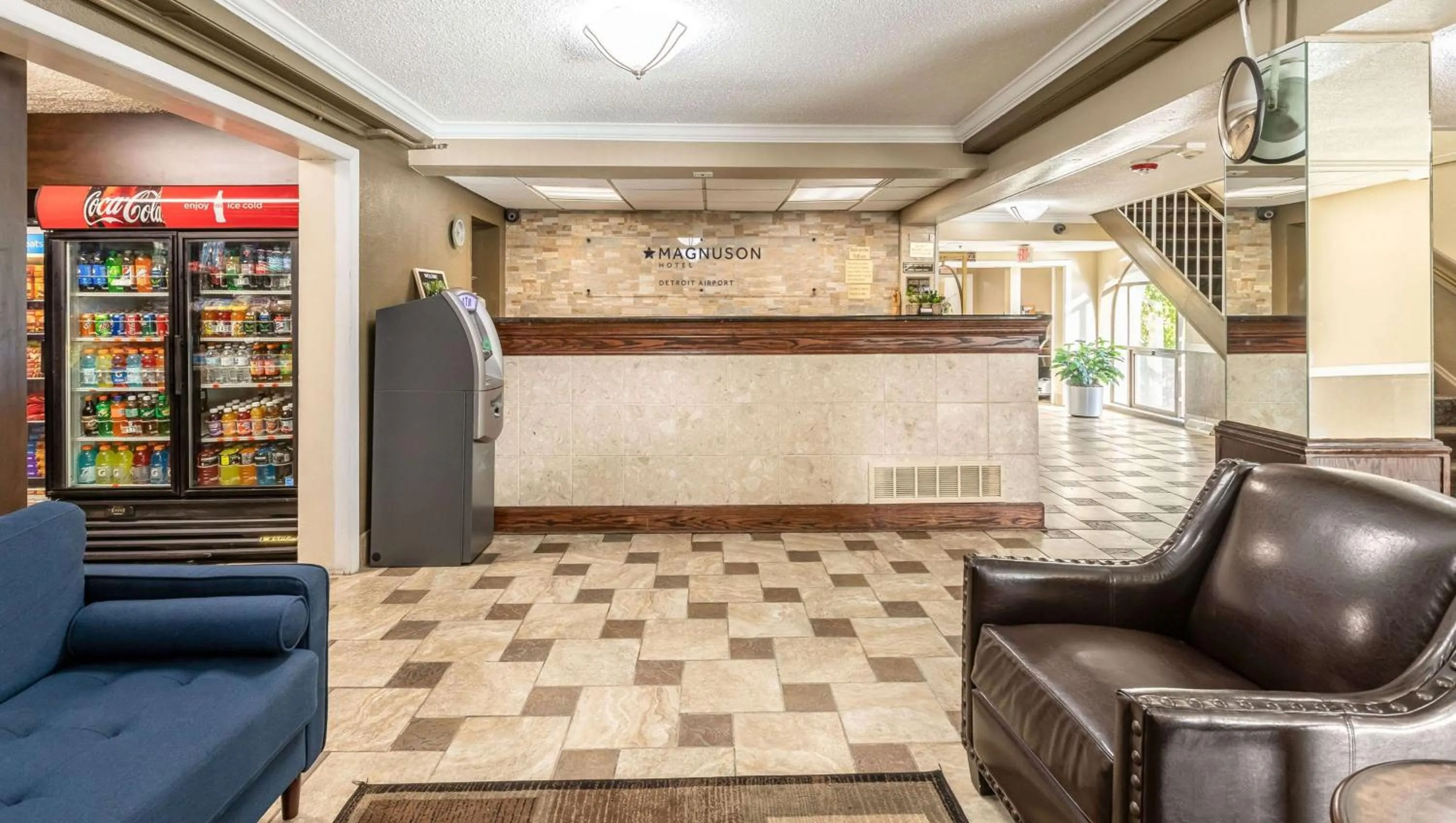 Lobby or reception in Magnuson Hotel Detroit Airport