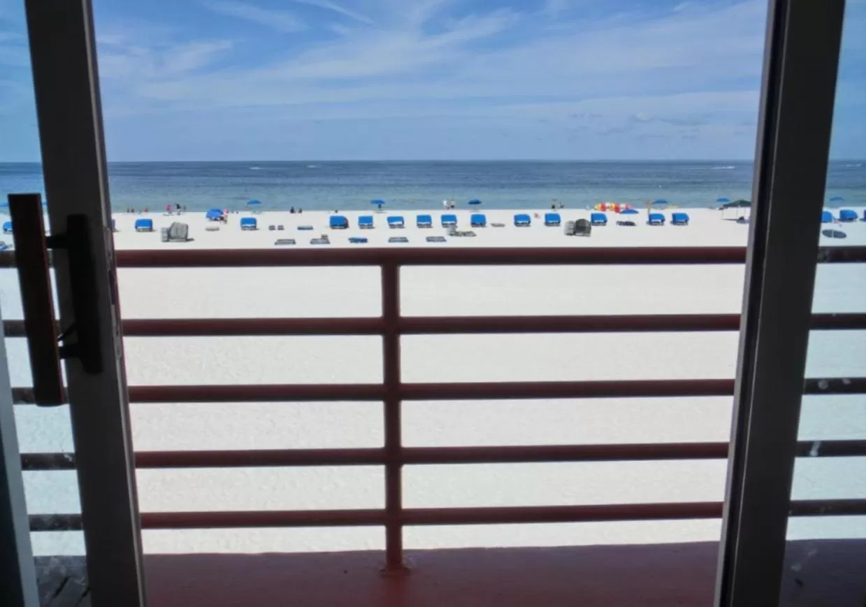 Queen Room with Two Queen Beds and Beach View in Dolphin Beach Resort