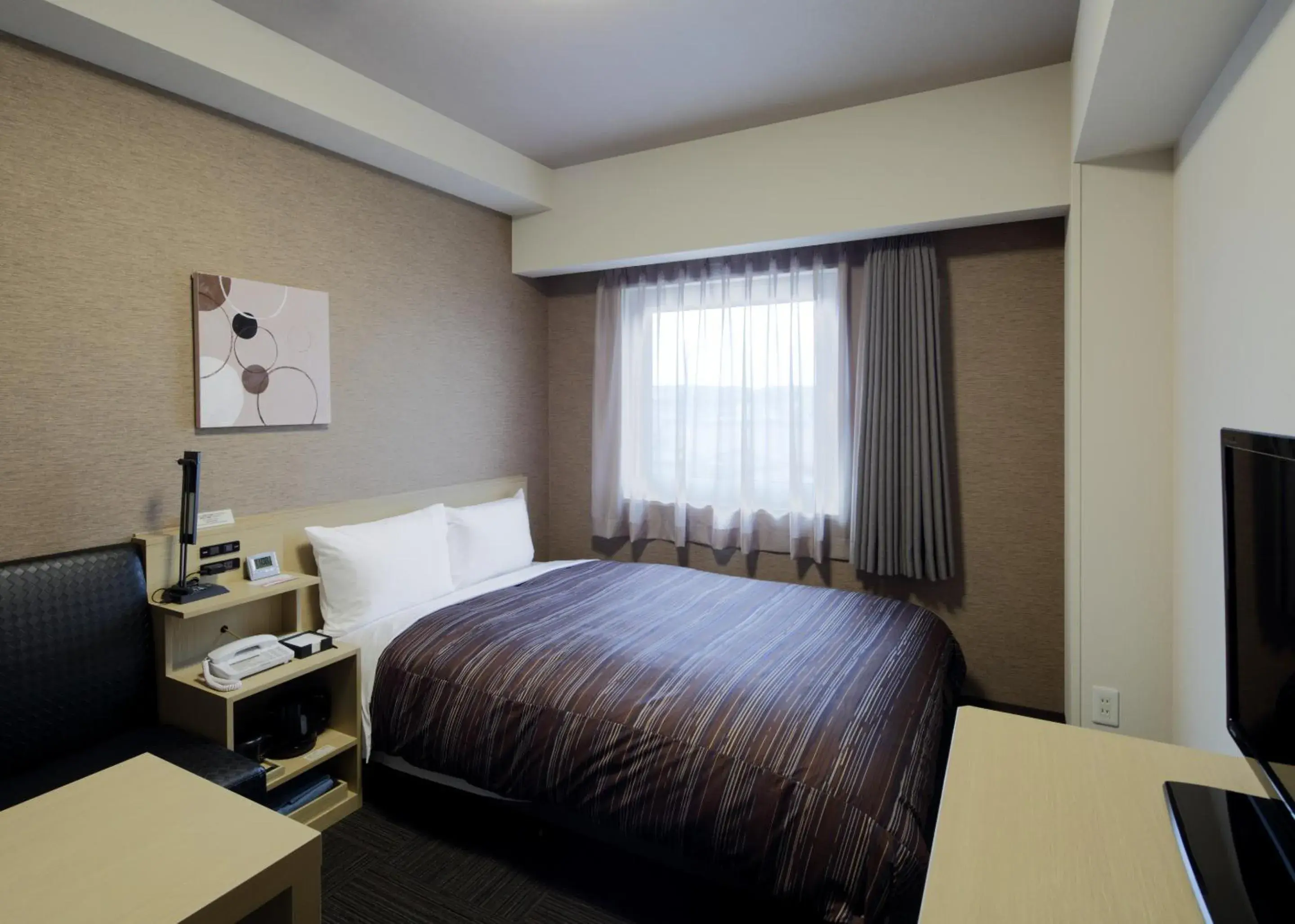 Bed in Hotel Route Inn Chiba Newtown Chuo Ekimae - Narita Airport Access Line