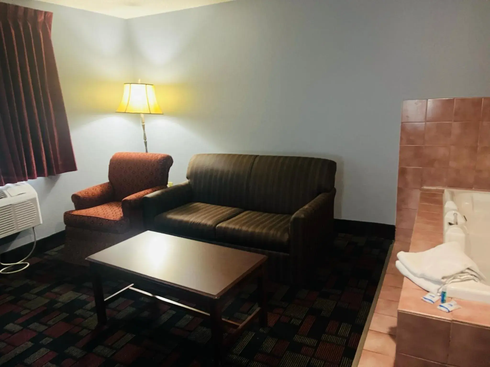 Living room, Seating Area in Rodeway Inn