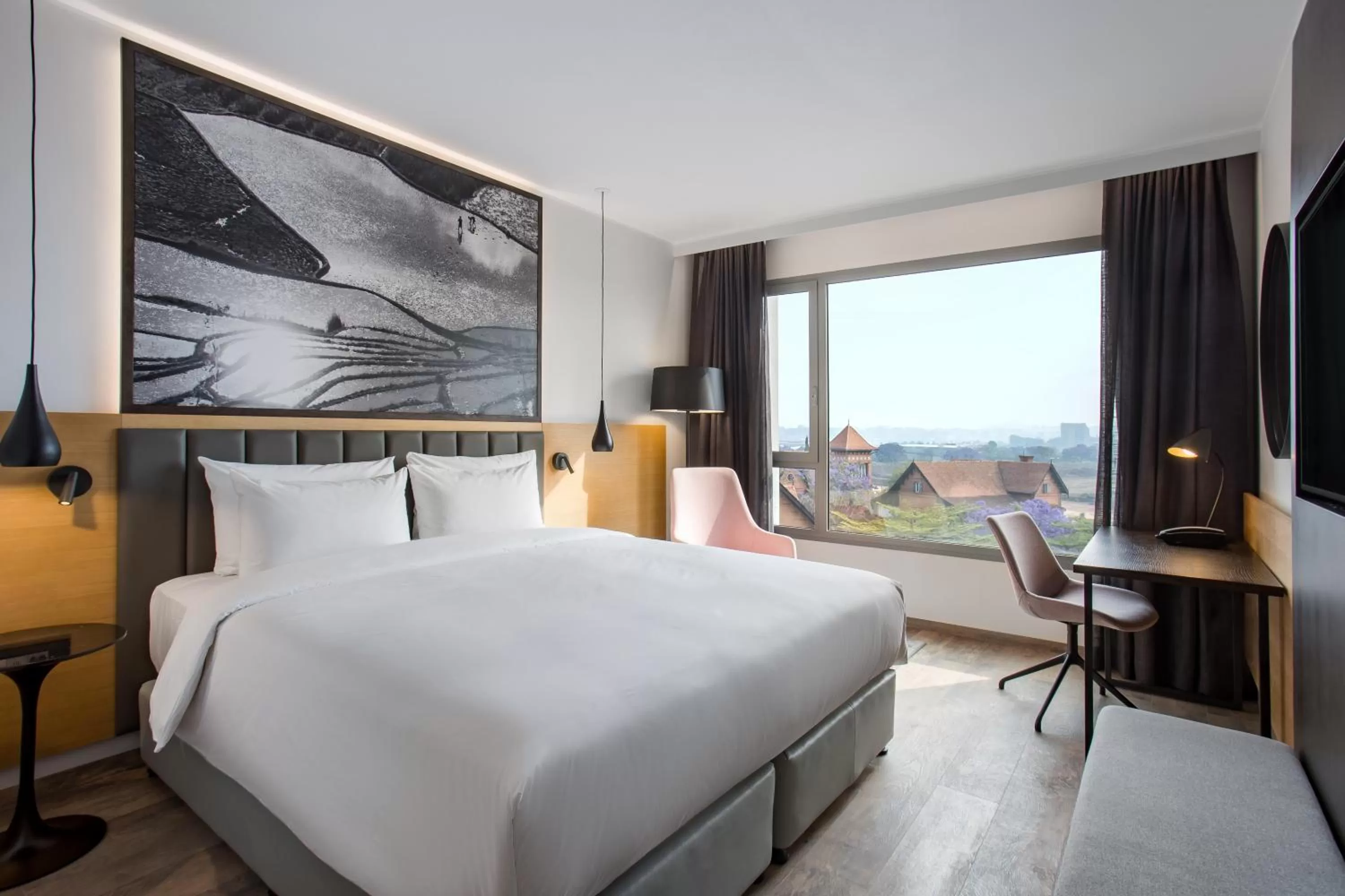 Photo of the whole room, Bed in Radisson Blu Hotel Antananarivo Waterfront