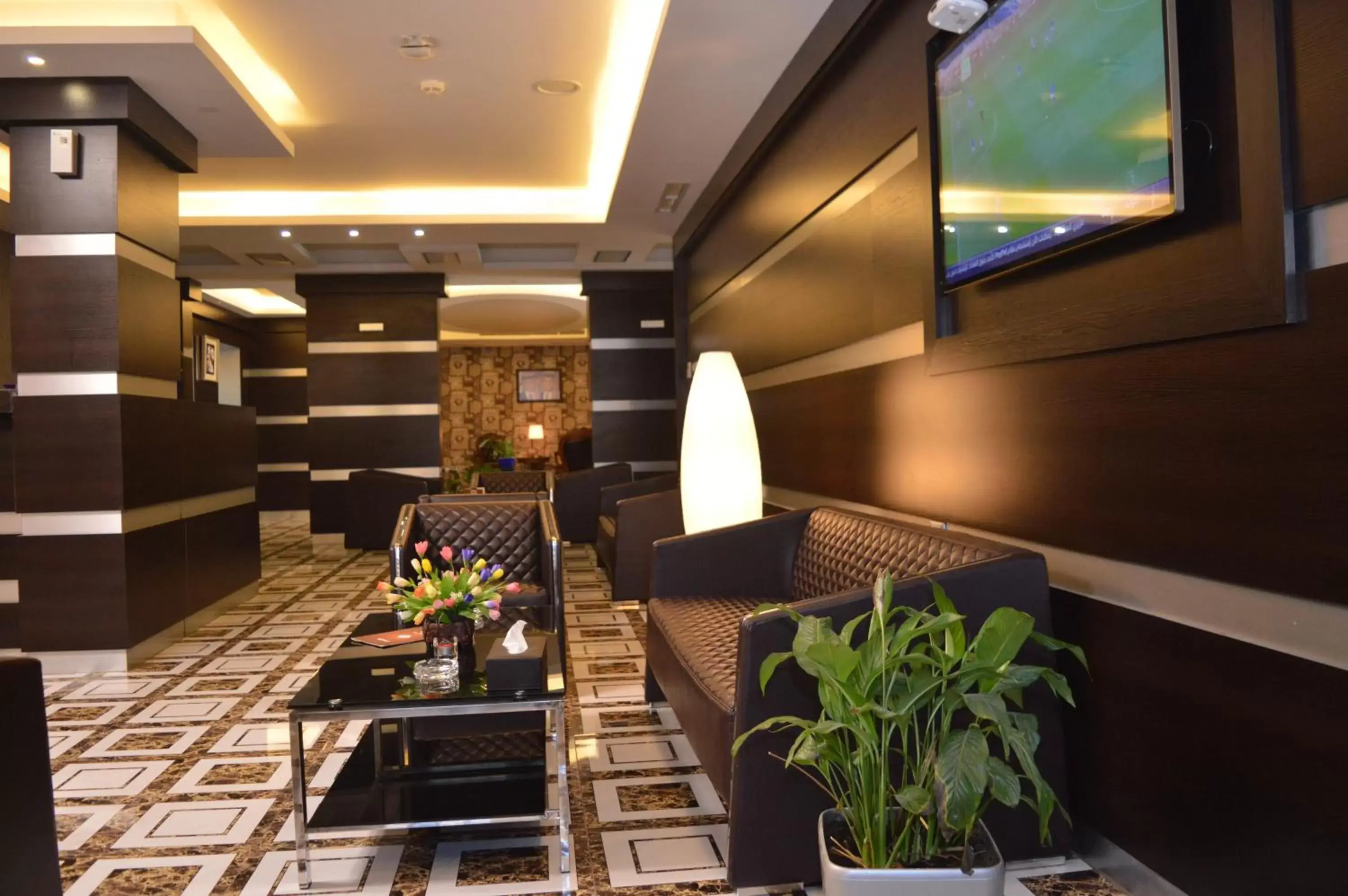 Lounge or bar in Tilal Almadina Hotel & Suites