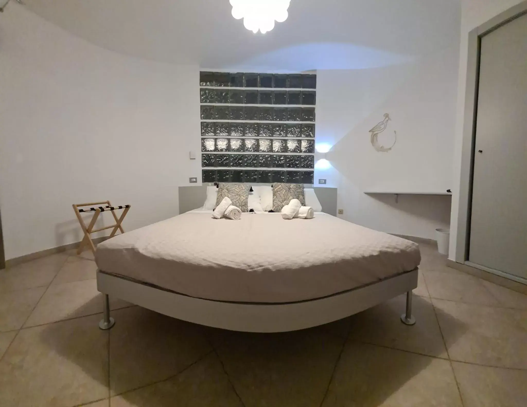 Bed in 215 addaura luxury room