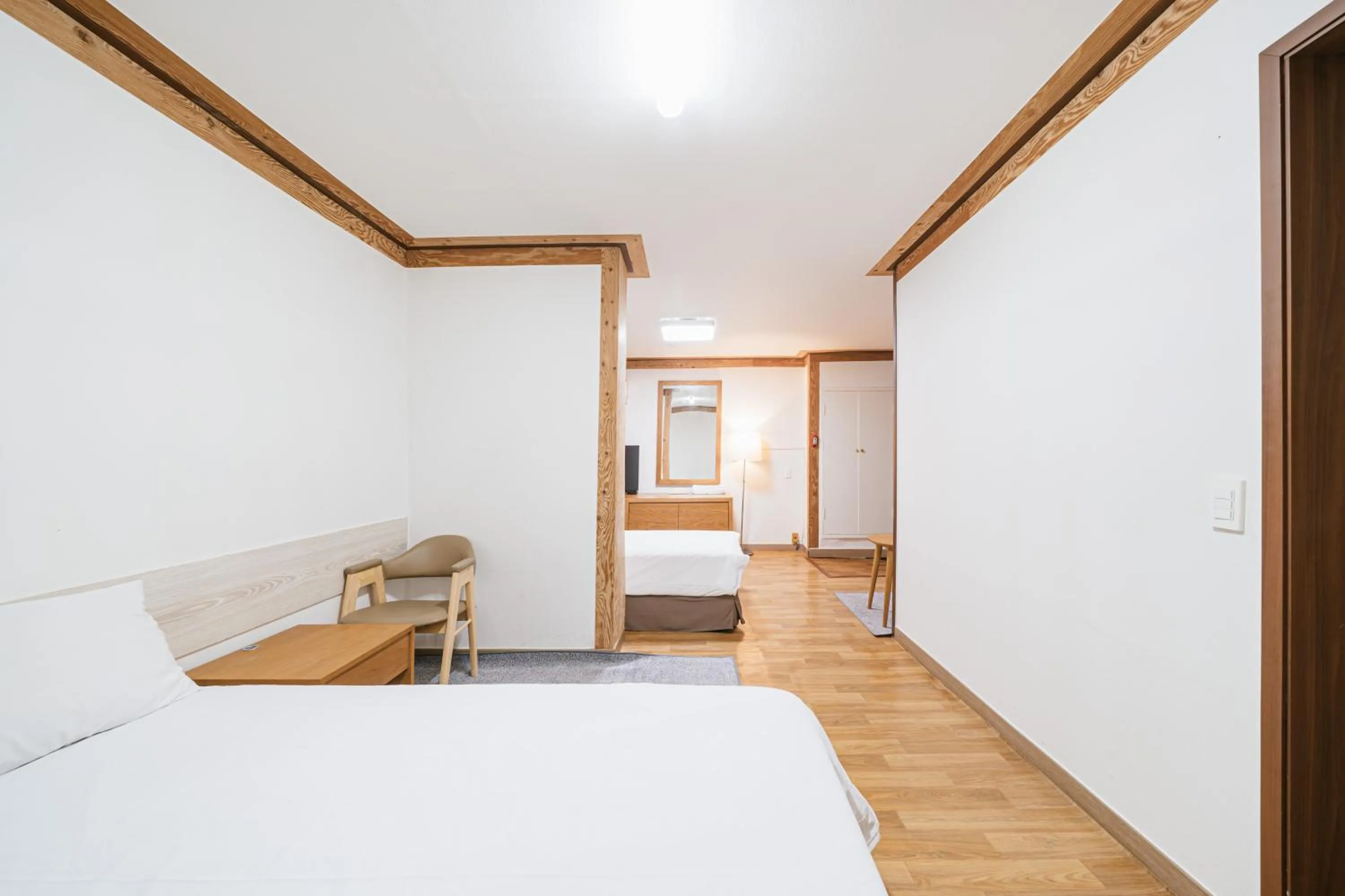 Bed in Jeju Miracle Hotel