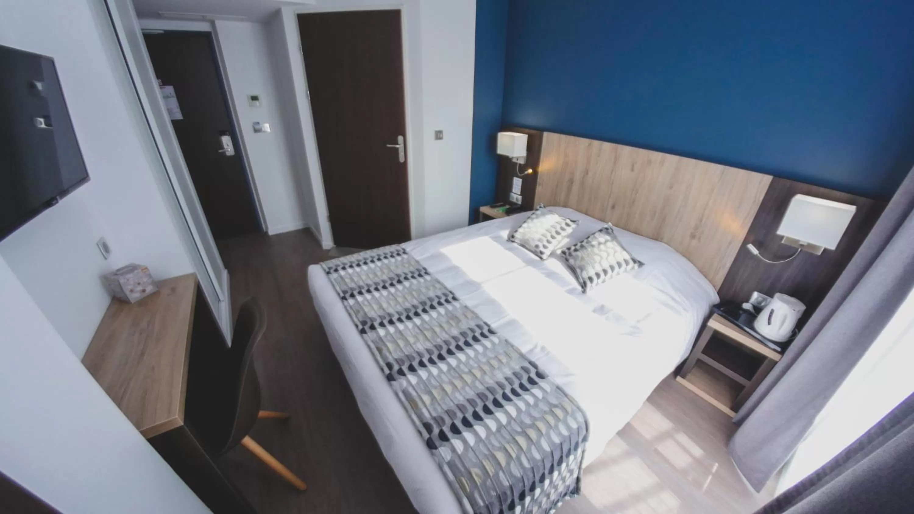 Bed in Hôtel du Tramway