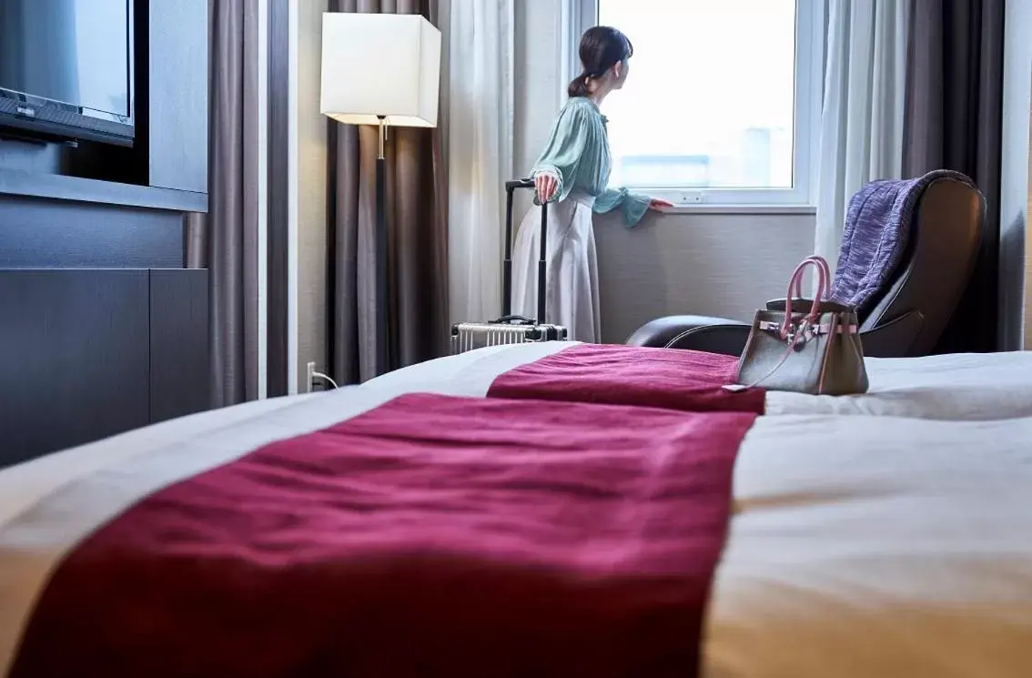 Bed in Daiwa Roynet Hotel Sapporo-Susukino
