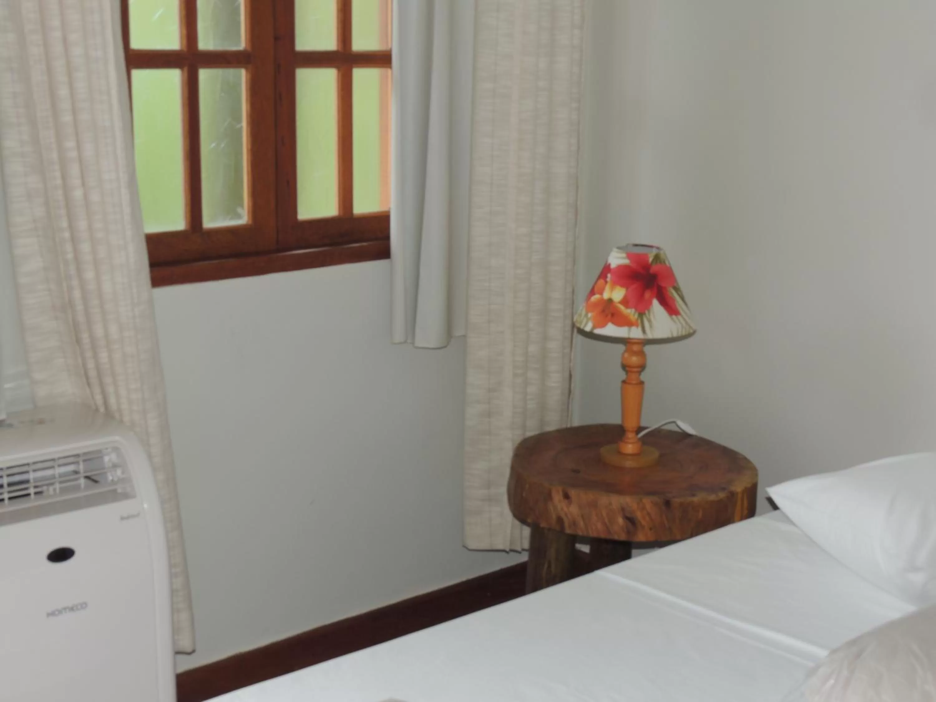 Bed in Pousada R.N.C. Nosso Paraíso