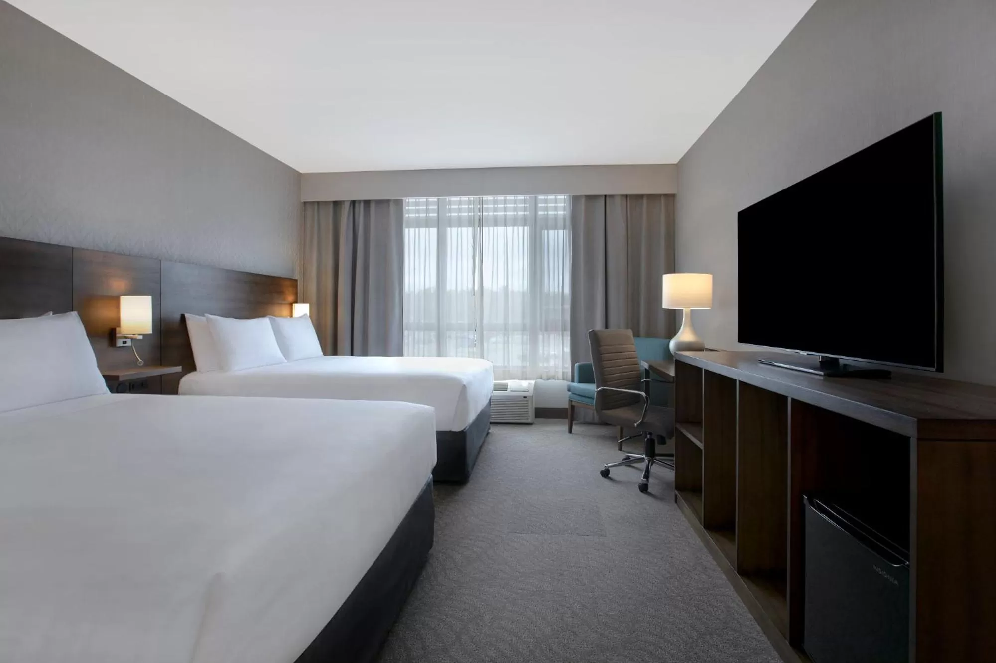 Bed in Great Blue Heron Hotel