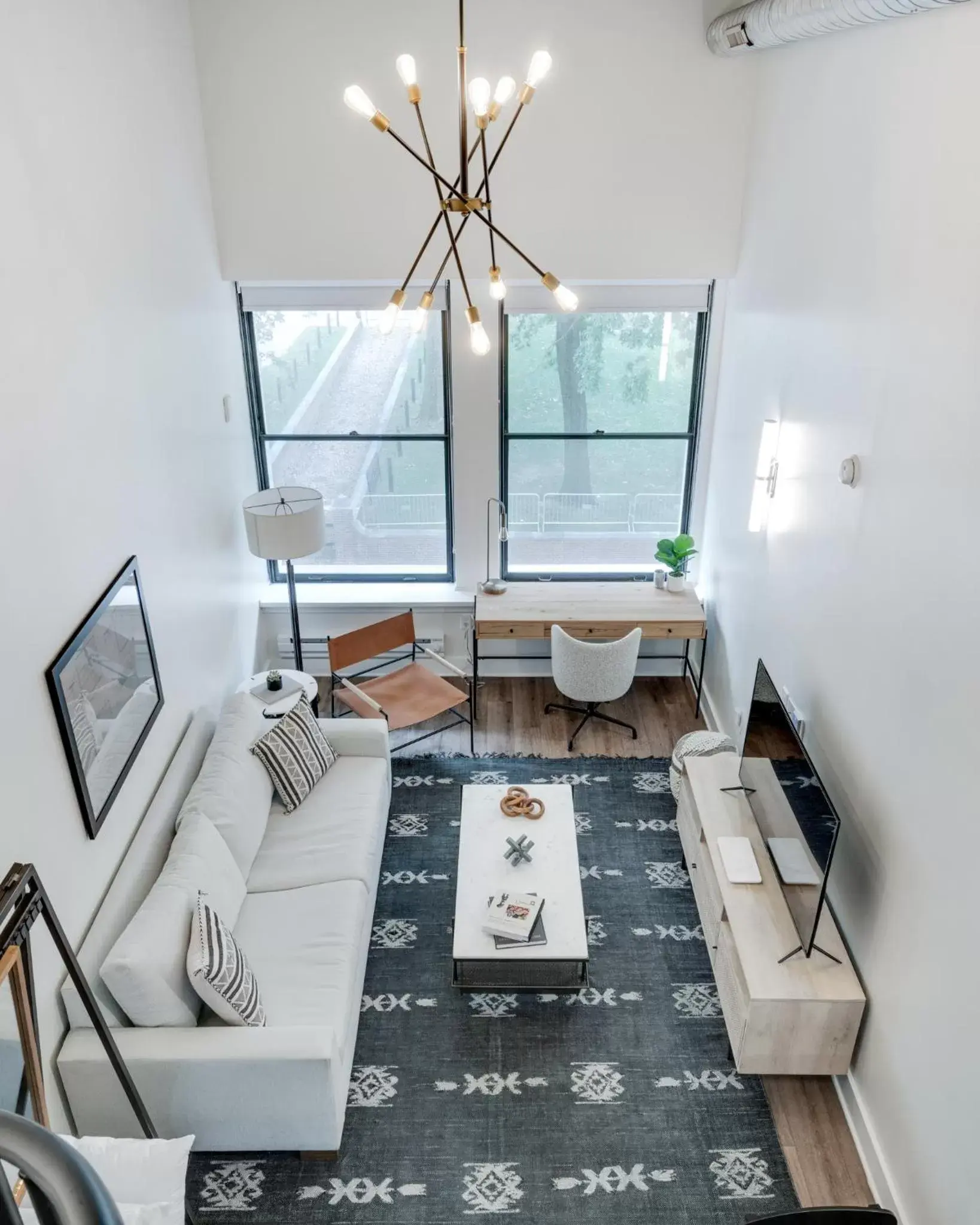 TV and multimedia, Seating Area in The Ledger Residences by Sosuite - Old City