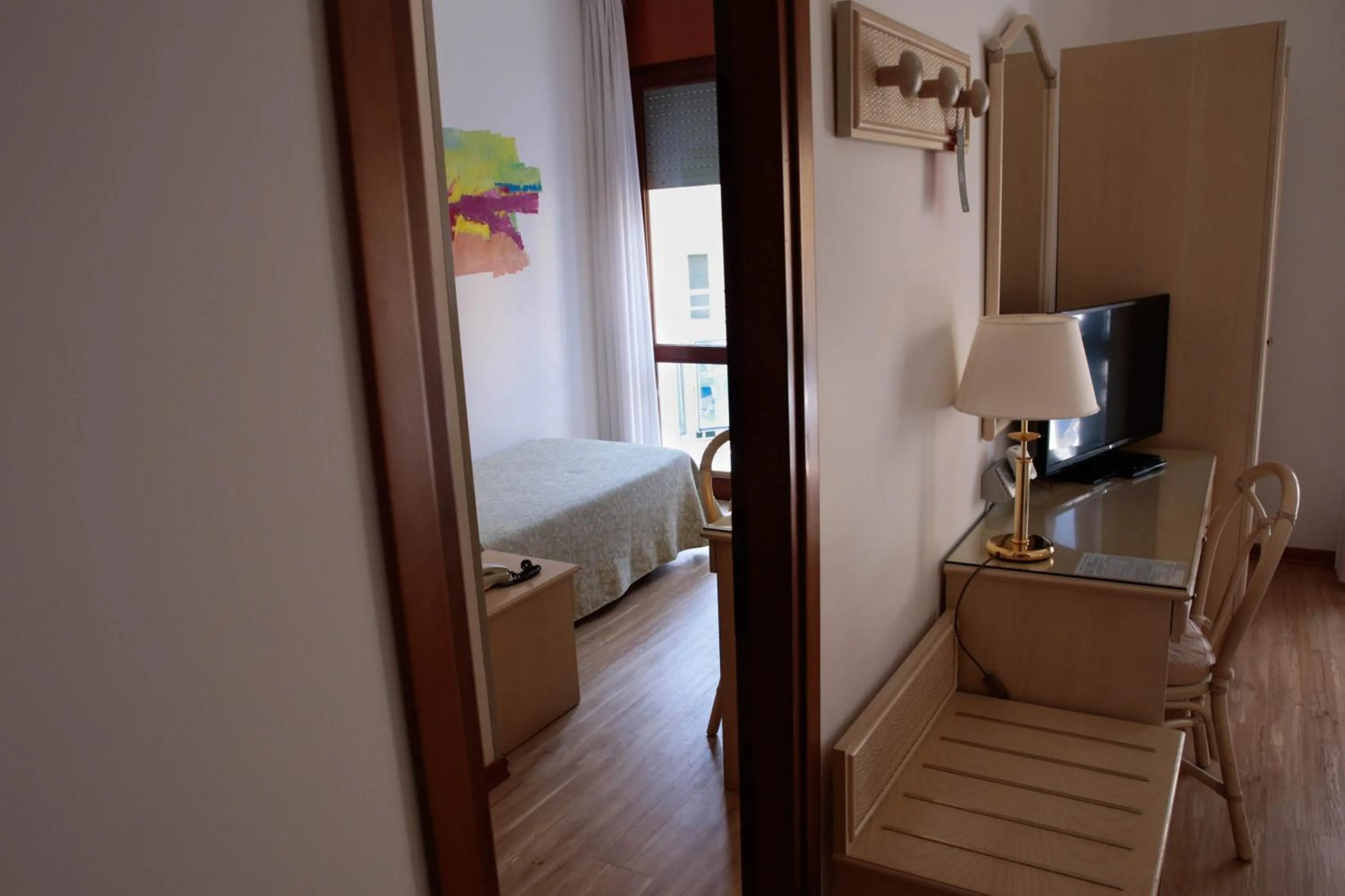 Family Room (2 Adults + 1 Child) in Hotel Croce Di Malta