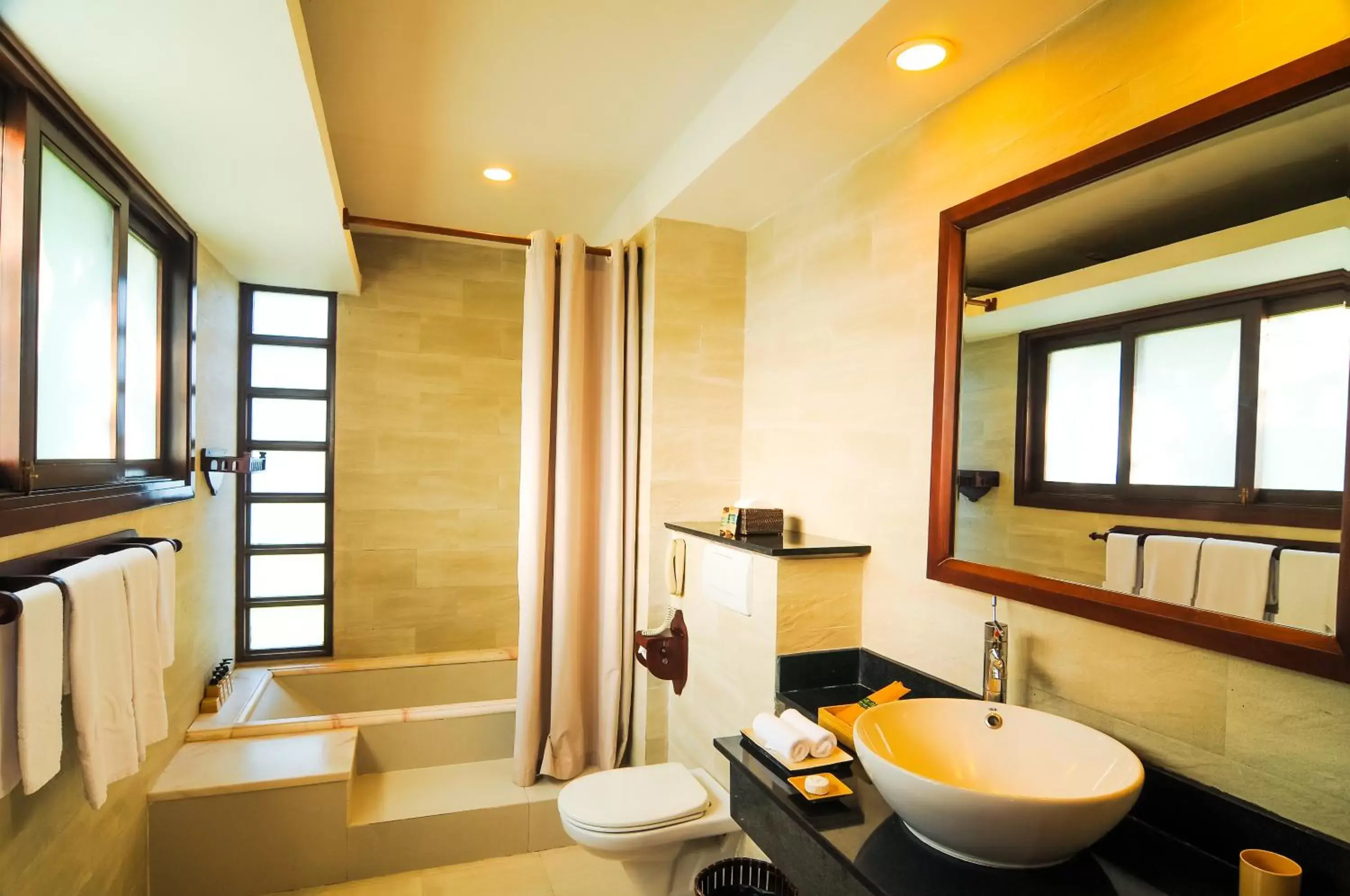 Bathroom in Palm Garden Beach Resort & Spa