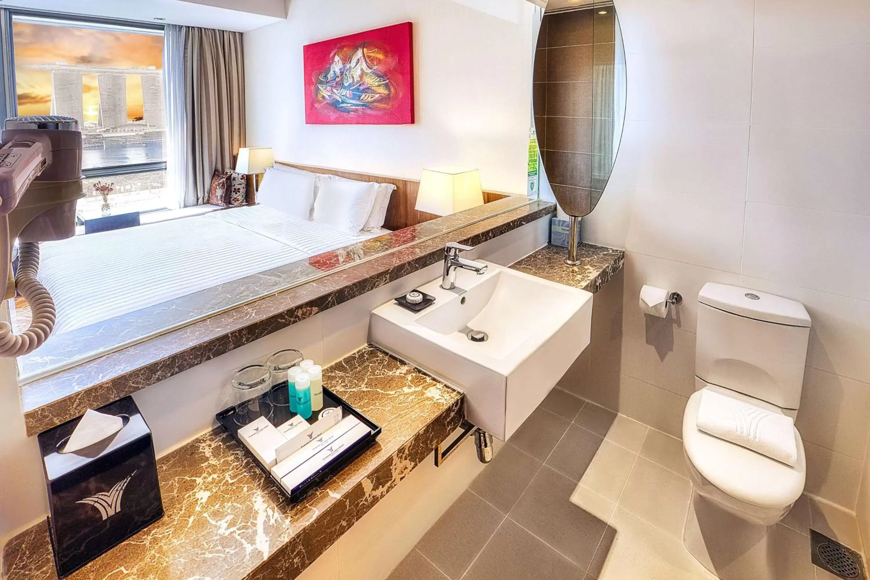 TV and multimedia, Bathroom in Peninsula Excelsior Singapore, A Wyndham Hotel