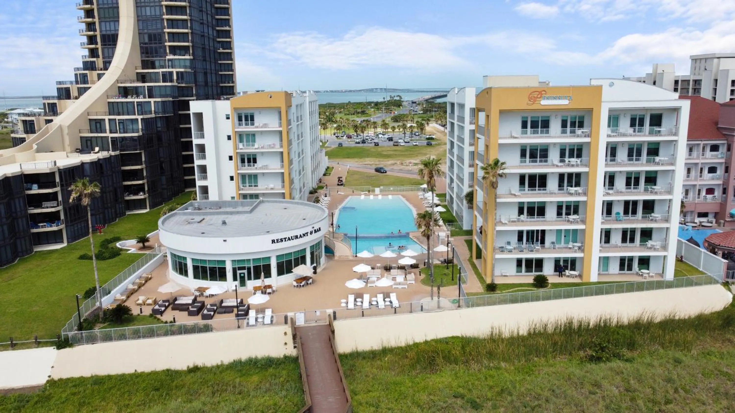 Property building in Peninsula Island Resort & Spa - Beachfront Property at South Padre Island