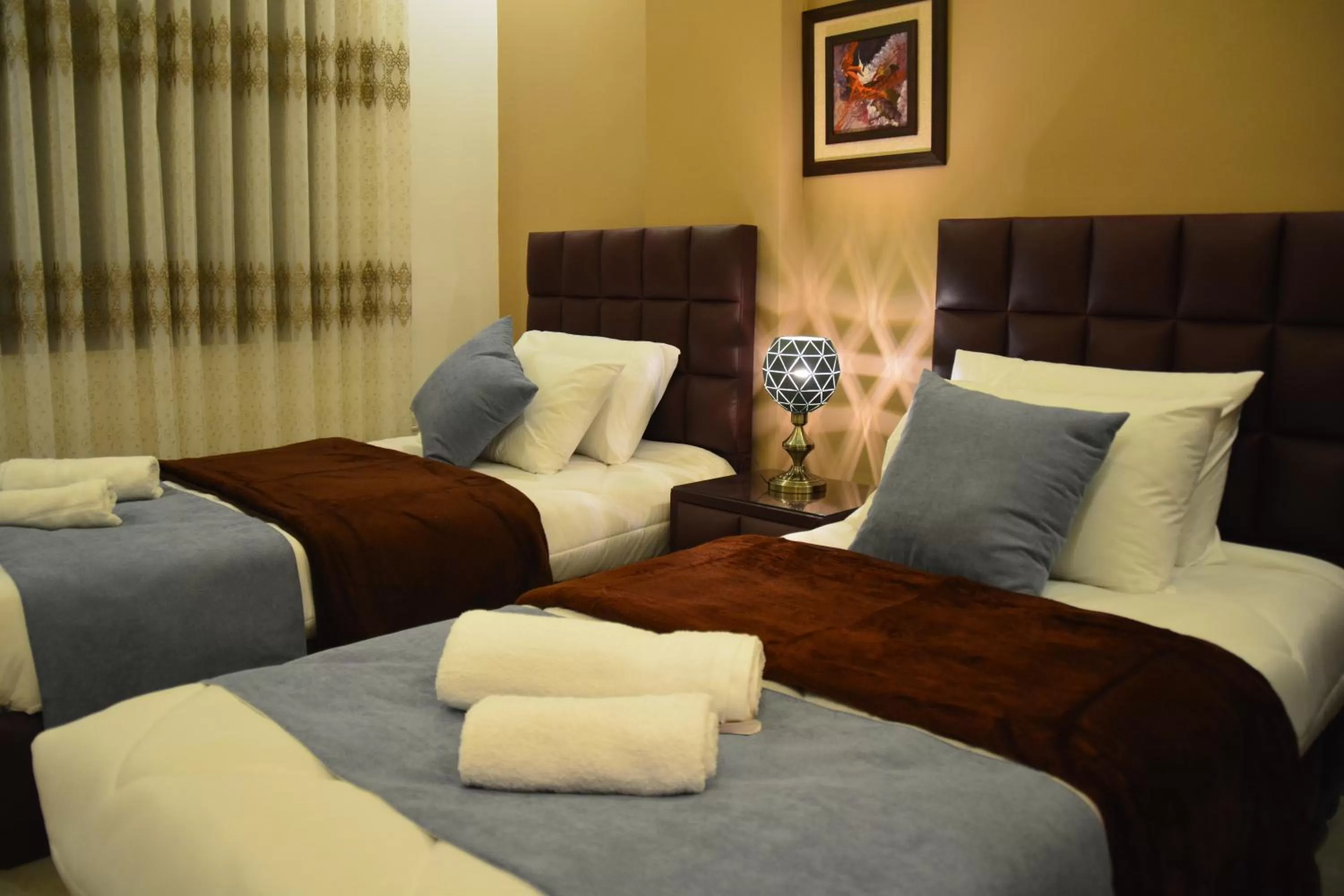 Bed in سما عمان للشقق الفندقية Sama Amman Hotel Apartments
