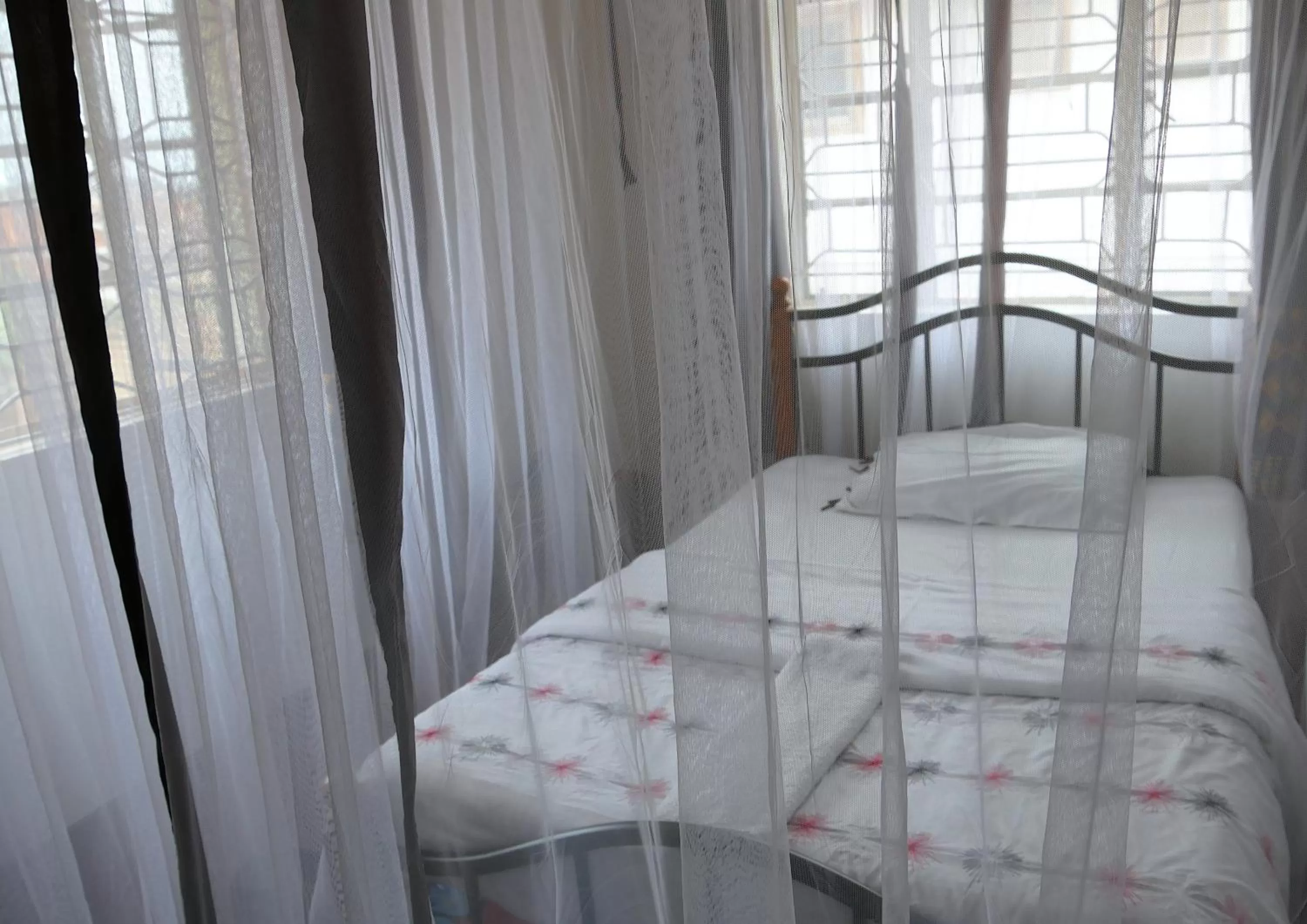 Bed in Hotel Acacia City