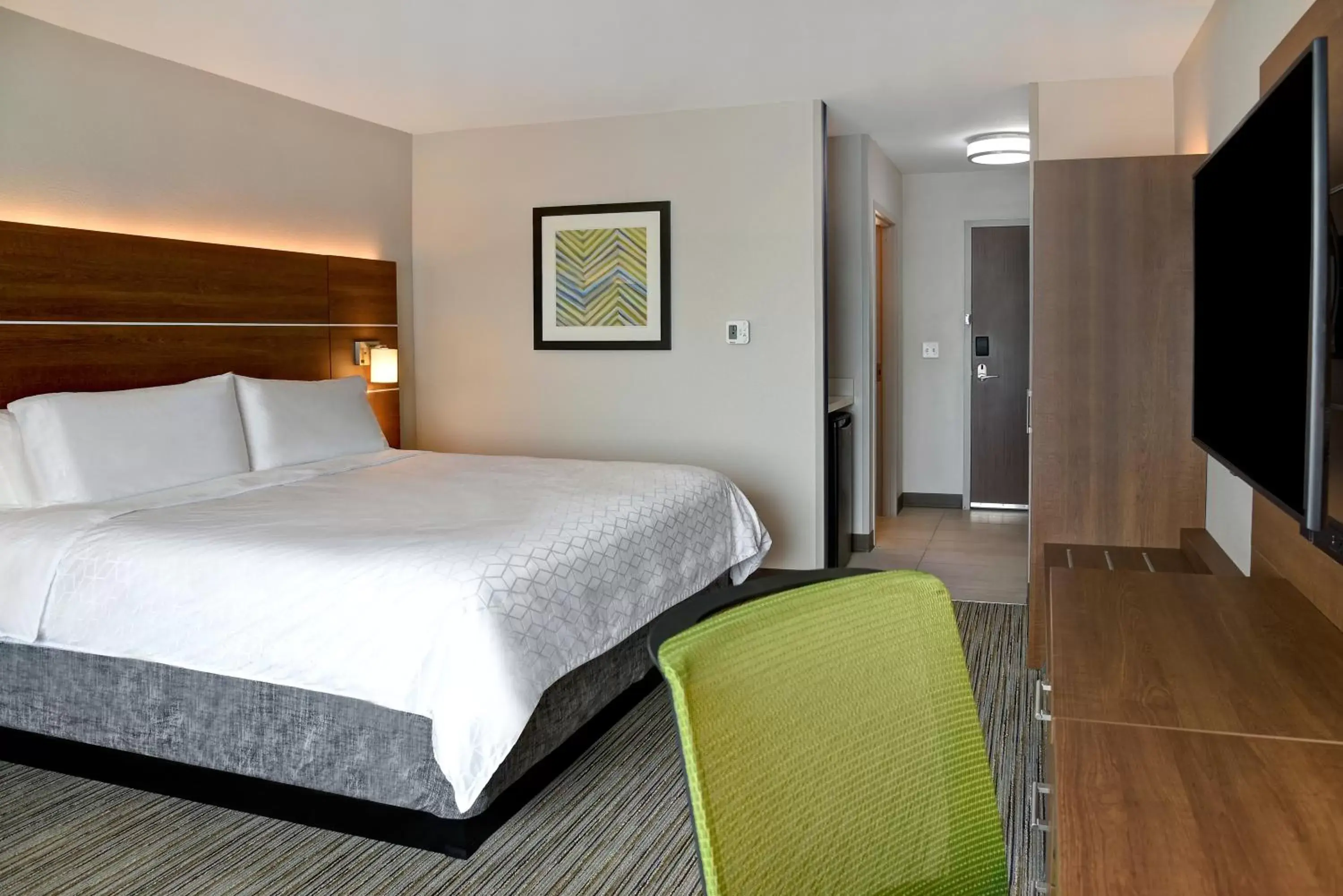 Bed in Holiday Inn Express & Suites - Ottawa, an IHG Hotel