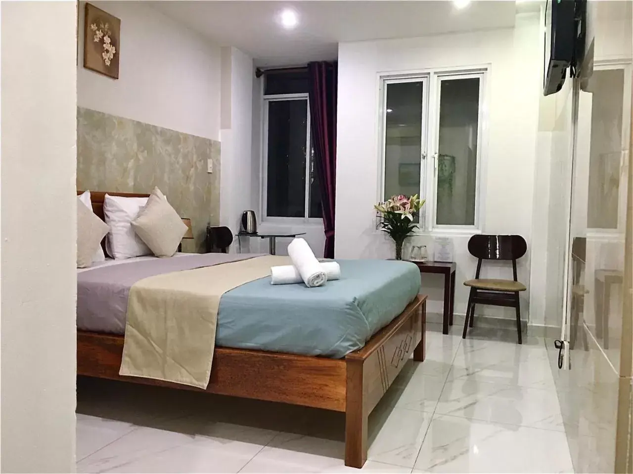 Bed in SaiGon CoZy Hotel "241 Pham Ngu Lao Street'' Bed in SaiGon CoZy Hotel "241 Pham Ngu Lao Street''