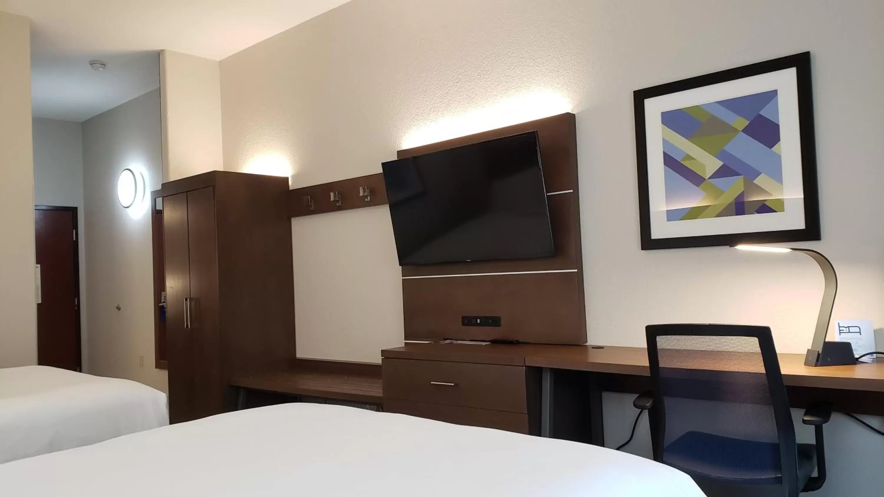 Photo of the whole room, TV/Entertainment Center in Holiday Inn Express Hotel and Suites Weslaco, an IHG Hotel